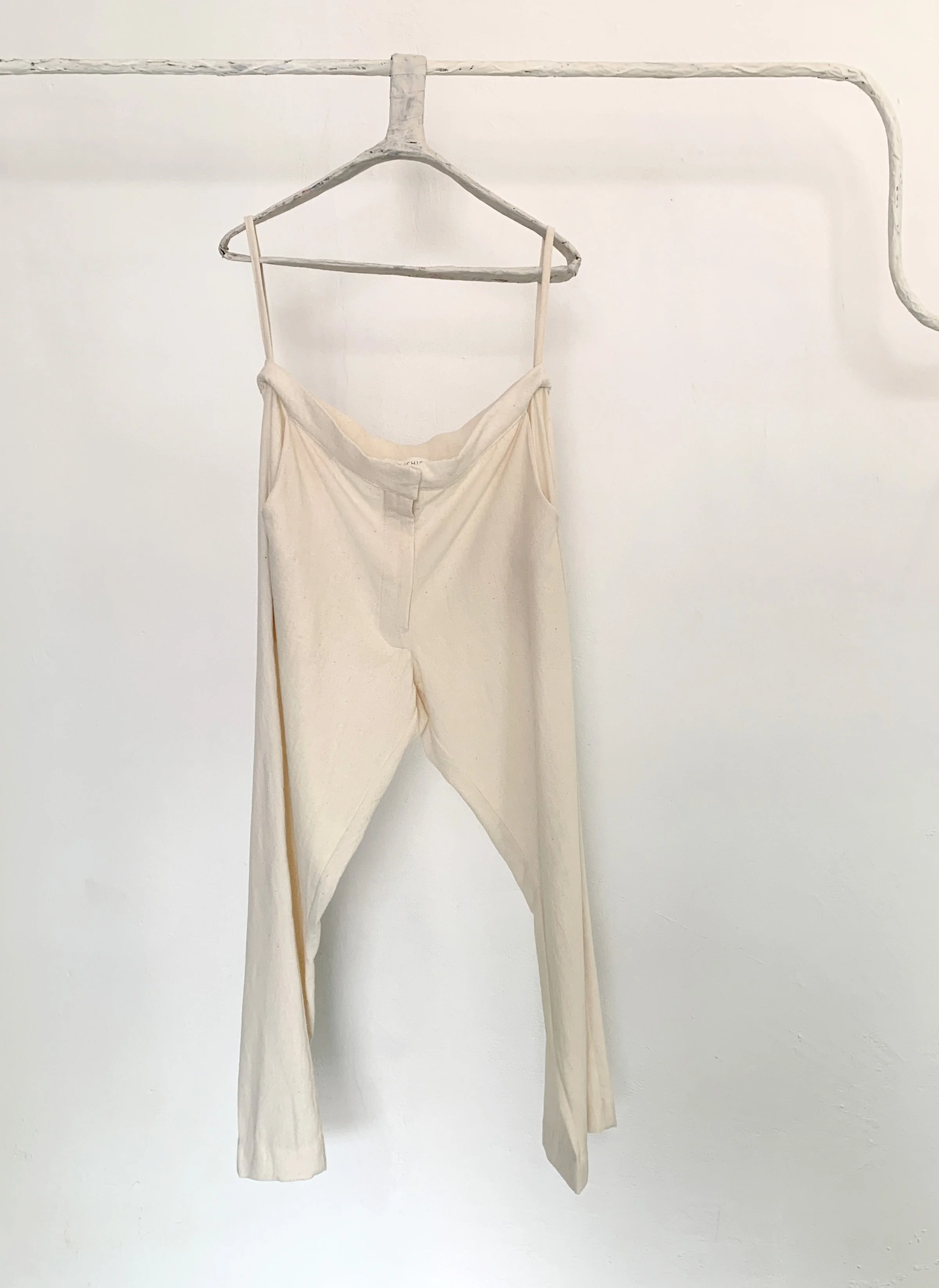 Mexchic clothing collection Anatomy shopping in Oaxaca, Mexico, simple, minimal, minimalist handmade with natural fabrics and fibers, ecological botanical dyes, regenerative cotton, and wool with Mexican artisans, weavers, spinners, red pottery baro 