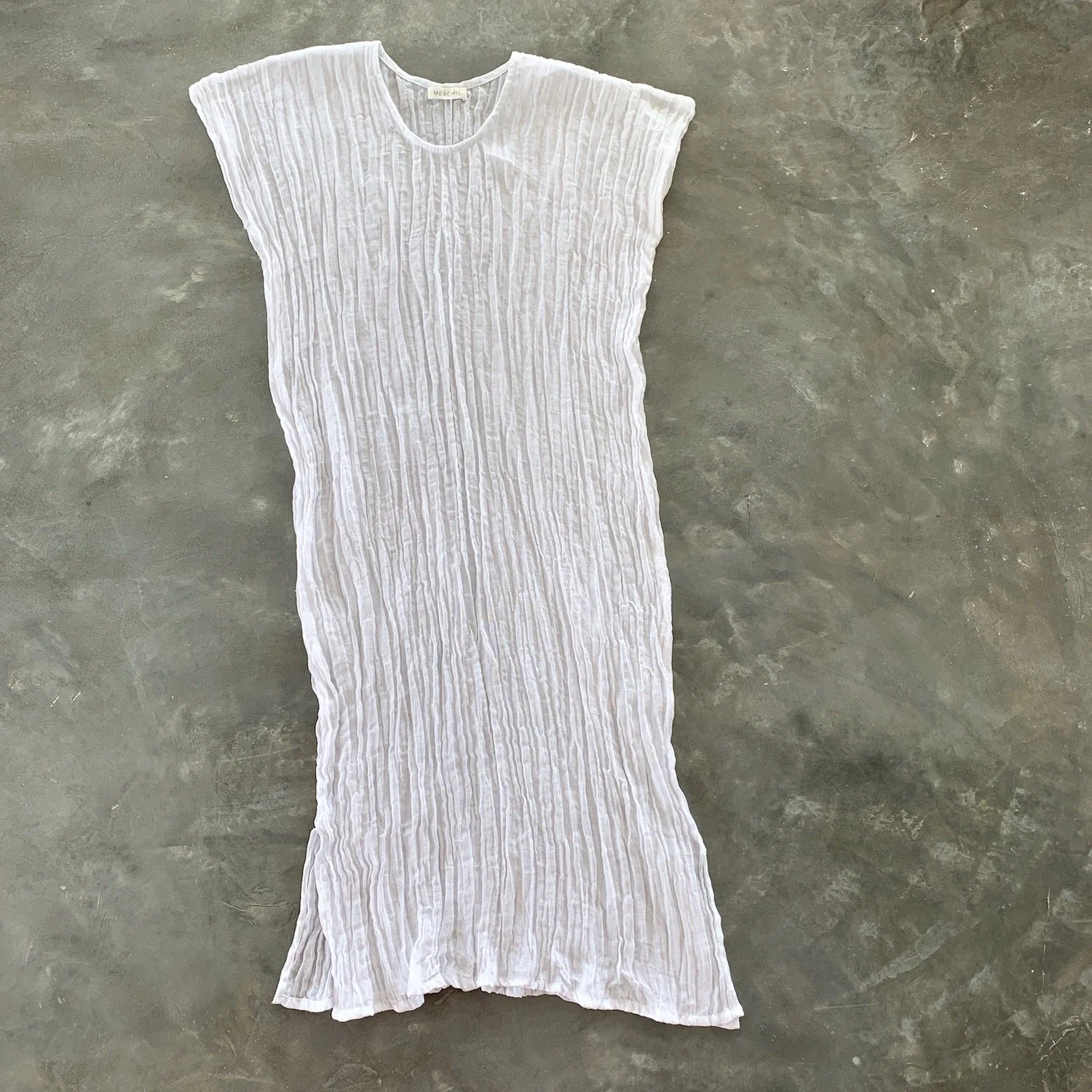 Mexchic gauze cotton clothing natural tunics summer lifestyle collection, shopping in Oaxaca Mexico ethically made sustainable hand woven handmade regenerative cotton natural dyes botanical dyes contemporary fashion Mexican designer boutique luxury c