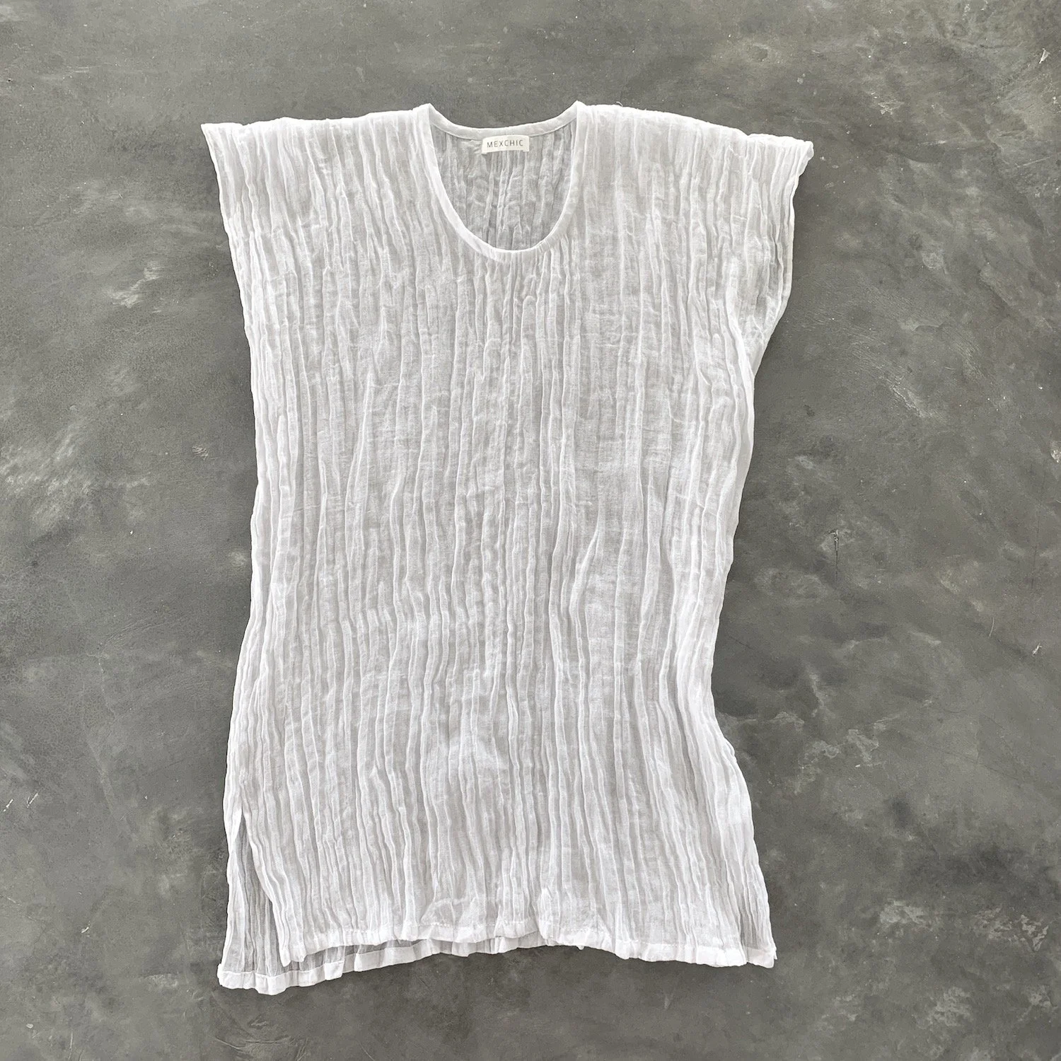 Mexchic gauze cotton clothing natural tunics summer lifestyle collection, shopping in Oaxaca Mexico ethically made sustainable hand woven handmade regenerative cotton natural dyes botanical dyes contemporary fashion Mexican designer boutique luxury c