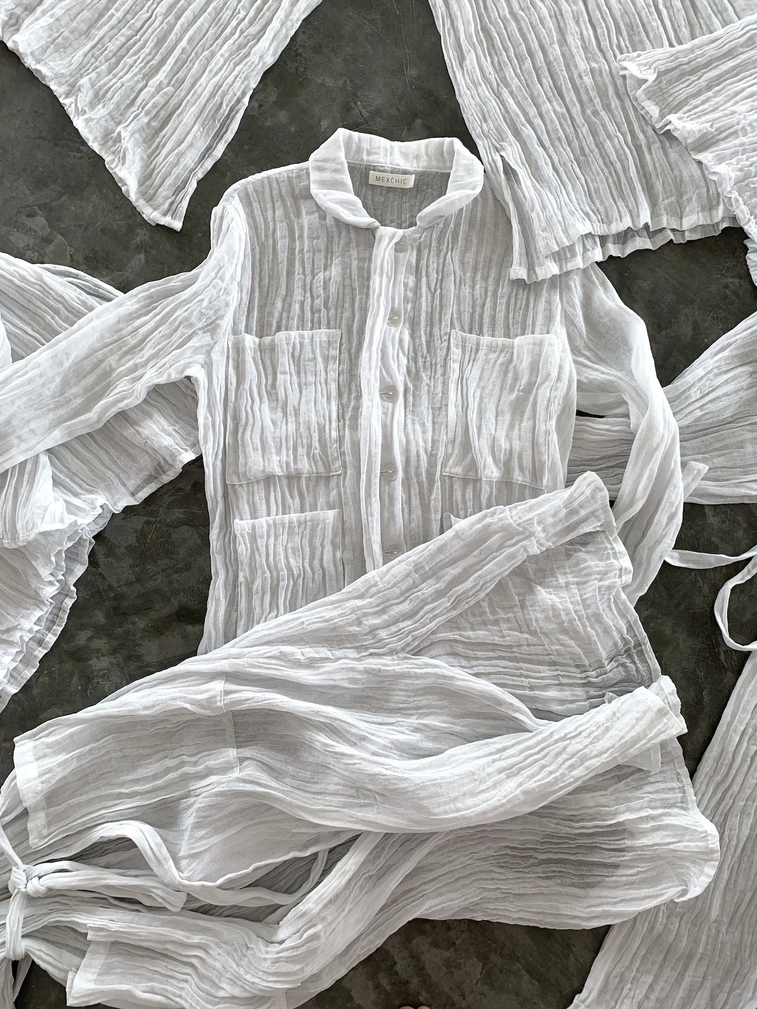 Mexchic gauze cotton clothing natural tunics summer lifestyle collection, shopping in Oaxaca Mexico ethically made sustainable hand woven handmade regenerative cotton natural dyes botanical dyes contemporary fashion Mexican designer boutique luxury c