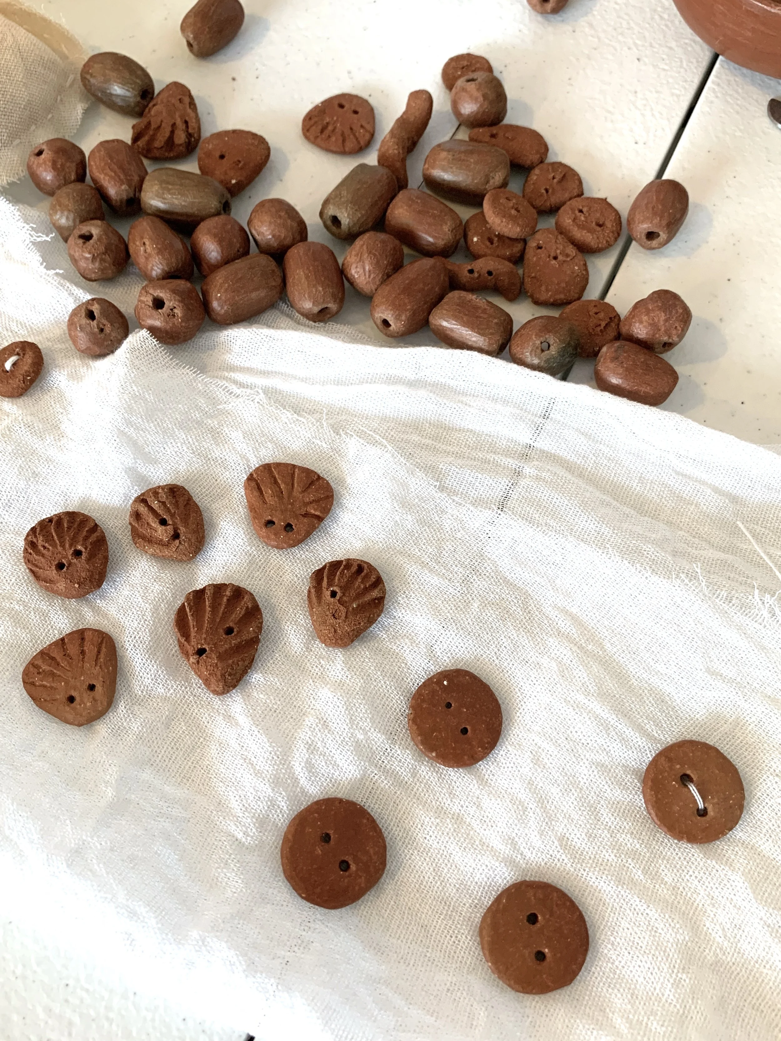 Mexchic Shopping in Oaxaca mexico for contemporary craft of Mexican design for natural clothing ceramic clay buttons fire pit san marcos tlapazola oaxaca mexico zapotec indigenous culture mexican artist regenerative sustainable fashion ethical design