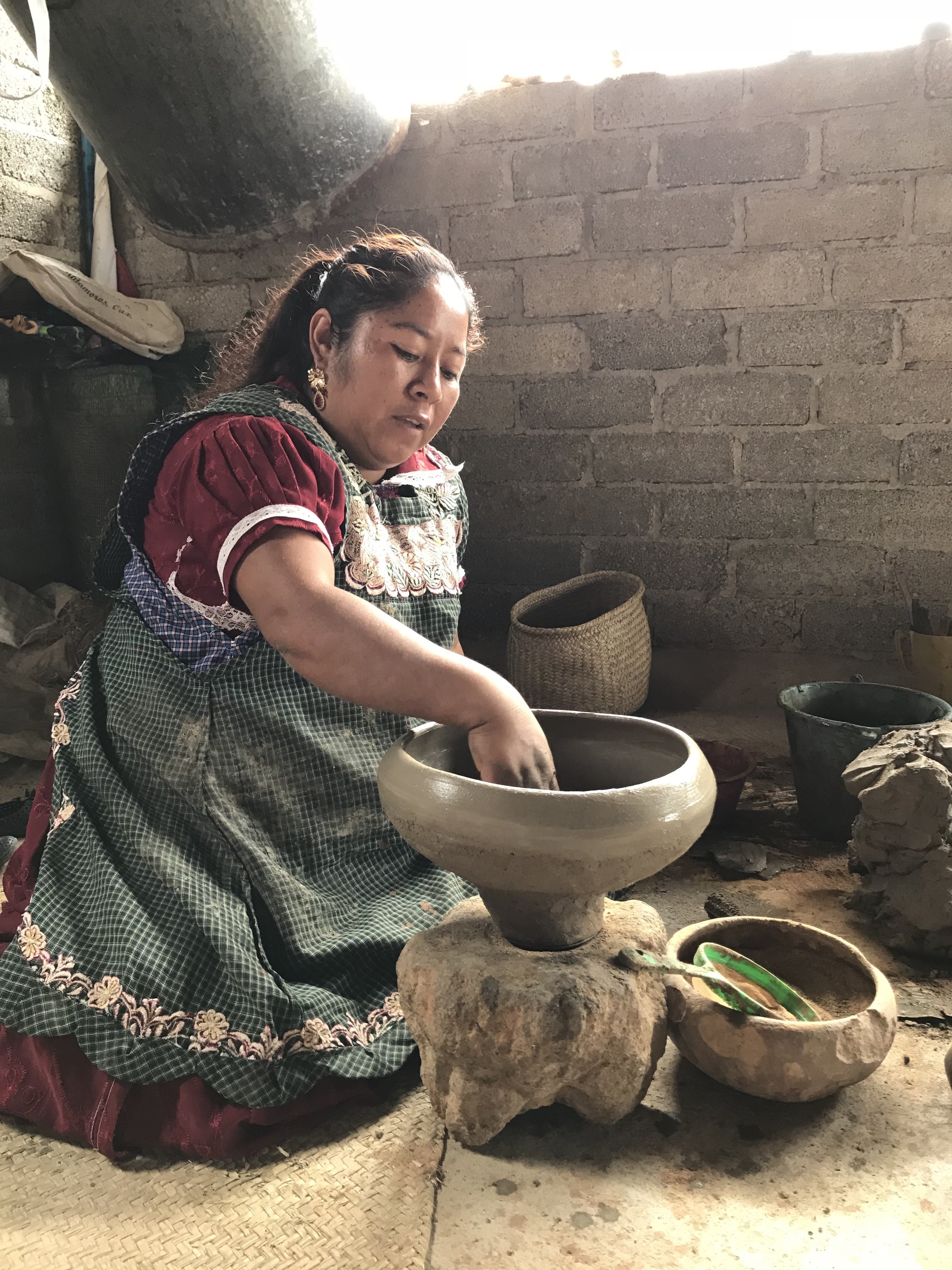 Mexchic Shopping in Oaxaca mexico for contemporary craft of Mexican design for natural clothing ceramic clay buttons fire pit san marcos tlapazola oaxaca mexico zapotec indigenous culture mexican artist regenerative sustainable fashion ethical design