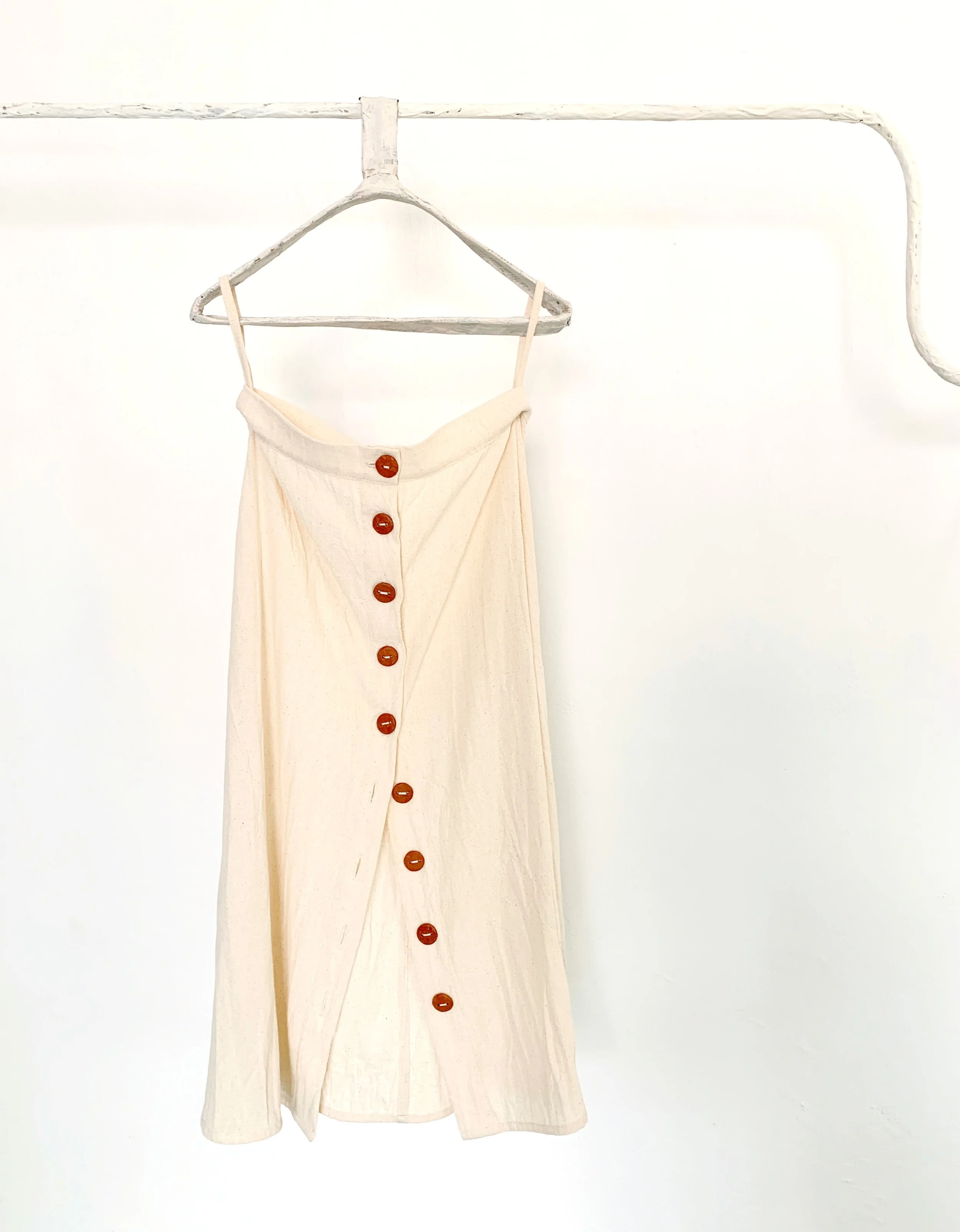 Mexchic Shopping in Oaxaca mexico for contemporary craft of Mexican design for natural clothing ceramic clay buttons fire pit san marcos tlapazola oaxaca mexico zapotec indigenous culture mexican artist regenerative sustainable fashion ethical design