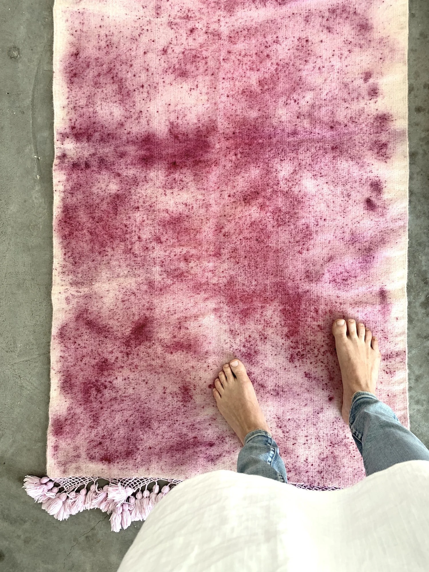 hand woven rug rugs oaxaca teotitlan del valle oaxaca mexico mexican fringe macrame hand knotted pom pom merino wool argentinian wool high quality home goods luxury artisan craft natural dyes botanically dyed hand dyed melon pink peach pink red ochre
