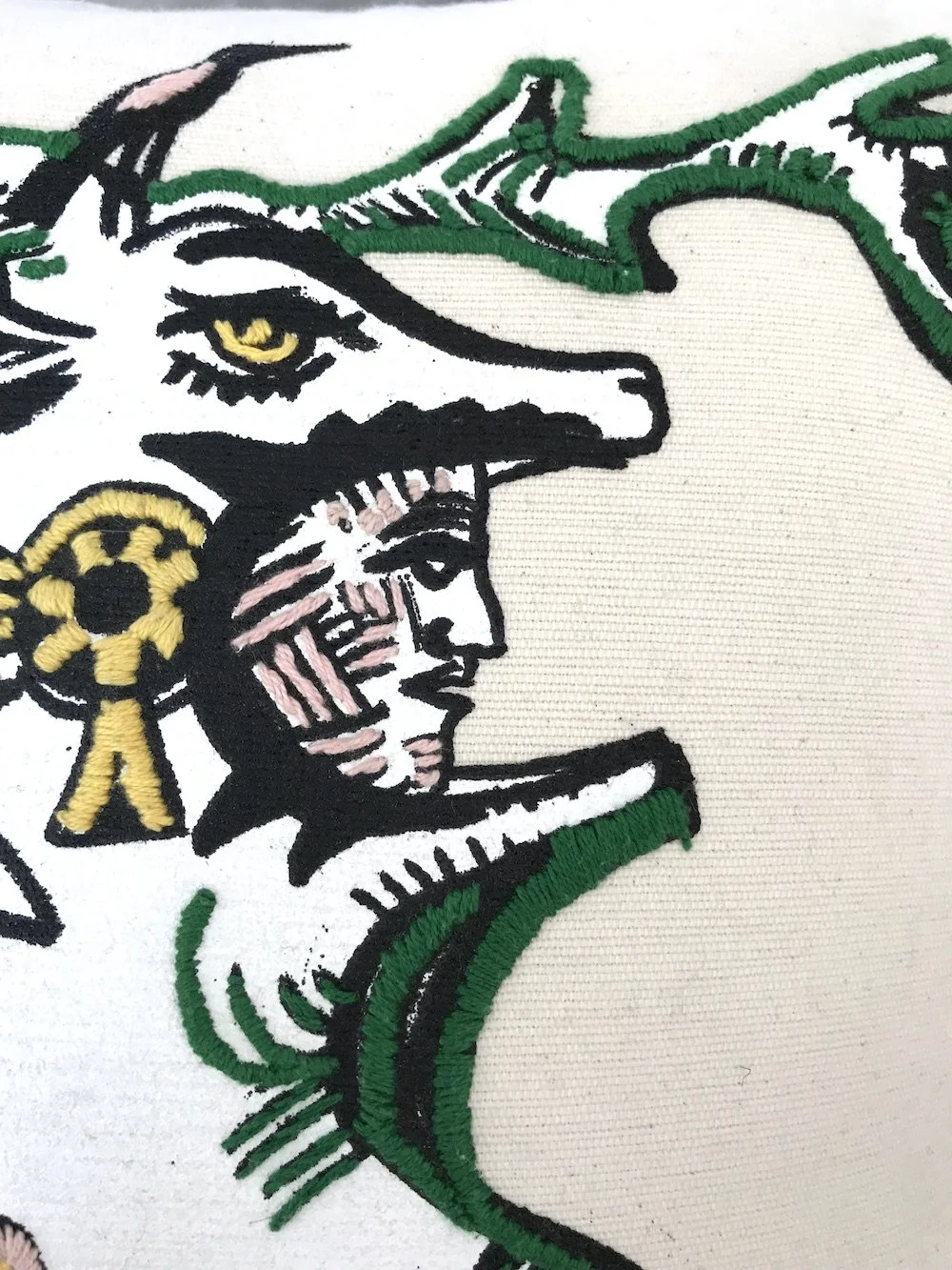 hand embroidered pillow throw decorative oaxaca mexico embroidery silk screen artist aztec miguel hernandez malinalco painter mexchic orange yellow pink purple blue green eagle deer lobo wolf iconography contemporary design designer  