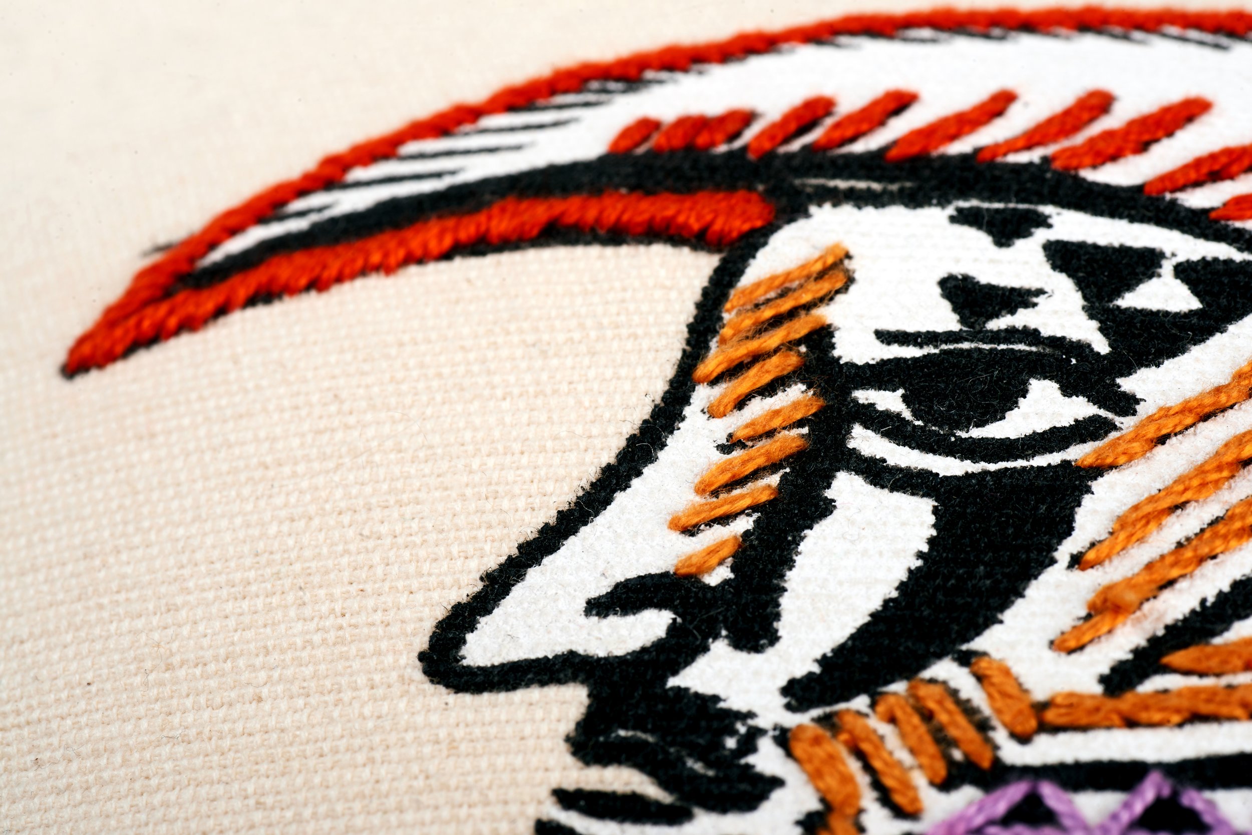 hand embroidered pillow throw decorative oaxaca mexico embroidery silk screen artist aztec miguel hernandez malinalco painter mexchic orange yellow pink purple blue green eagle deer lobo wolf iconography contemporary design designer  