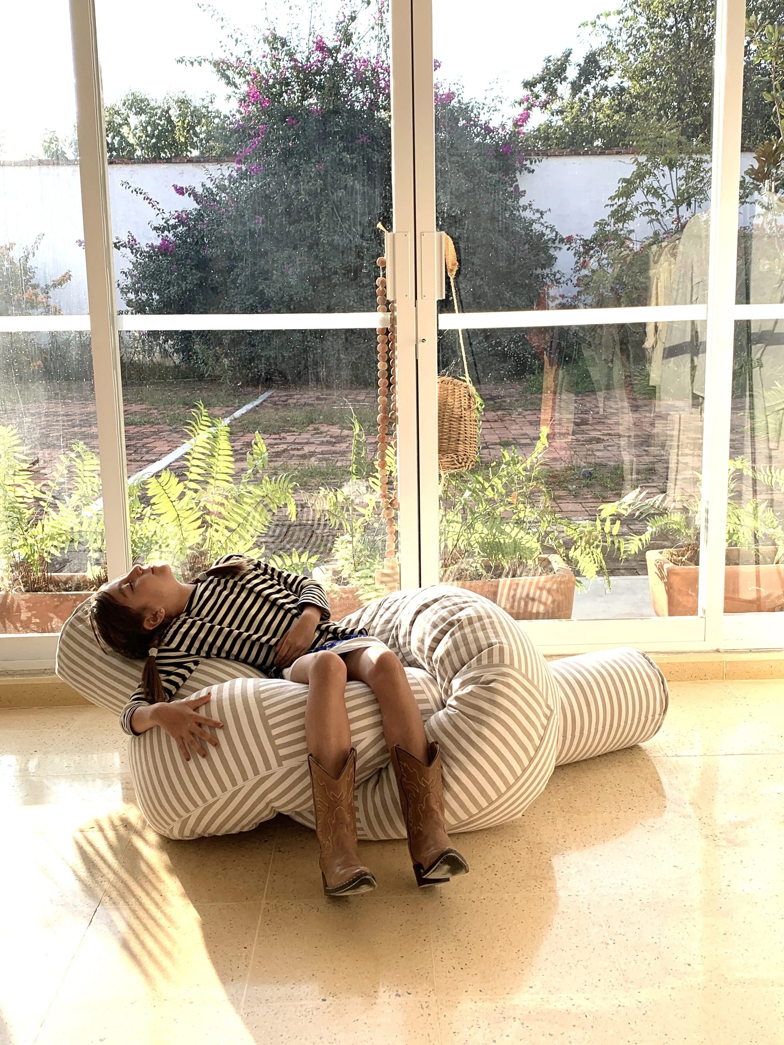 Mexchic Quetzalcoatl handwoven cotton pillow serpent snake seat chair oaxaca  mexchic wool contemporary design aztec pop culture soft sculpture Sol Lewitt linear beige tan cream white stripe