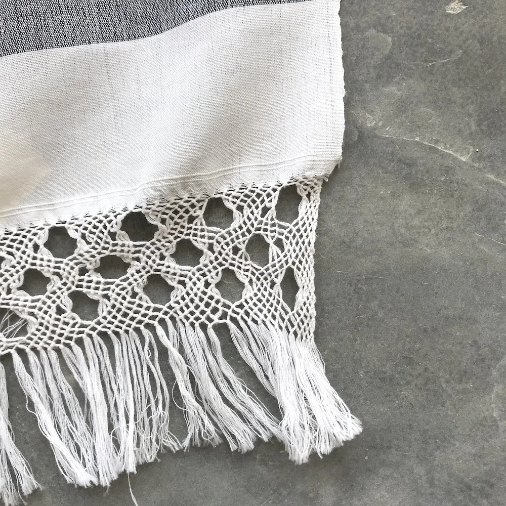 handwoven craft cotton embroidery macrame fringe rebozo shawl mexico mexican oaxaca chiapas toluca tenancingo estado de mexico highend highfashion moda textiles artisan artisanal natural dyes botanical dyes blue black plaid check blouse poncho top sh
