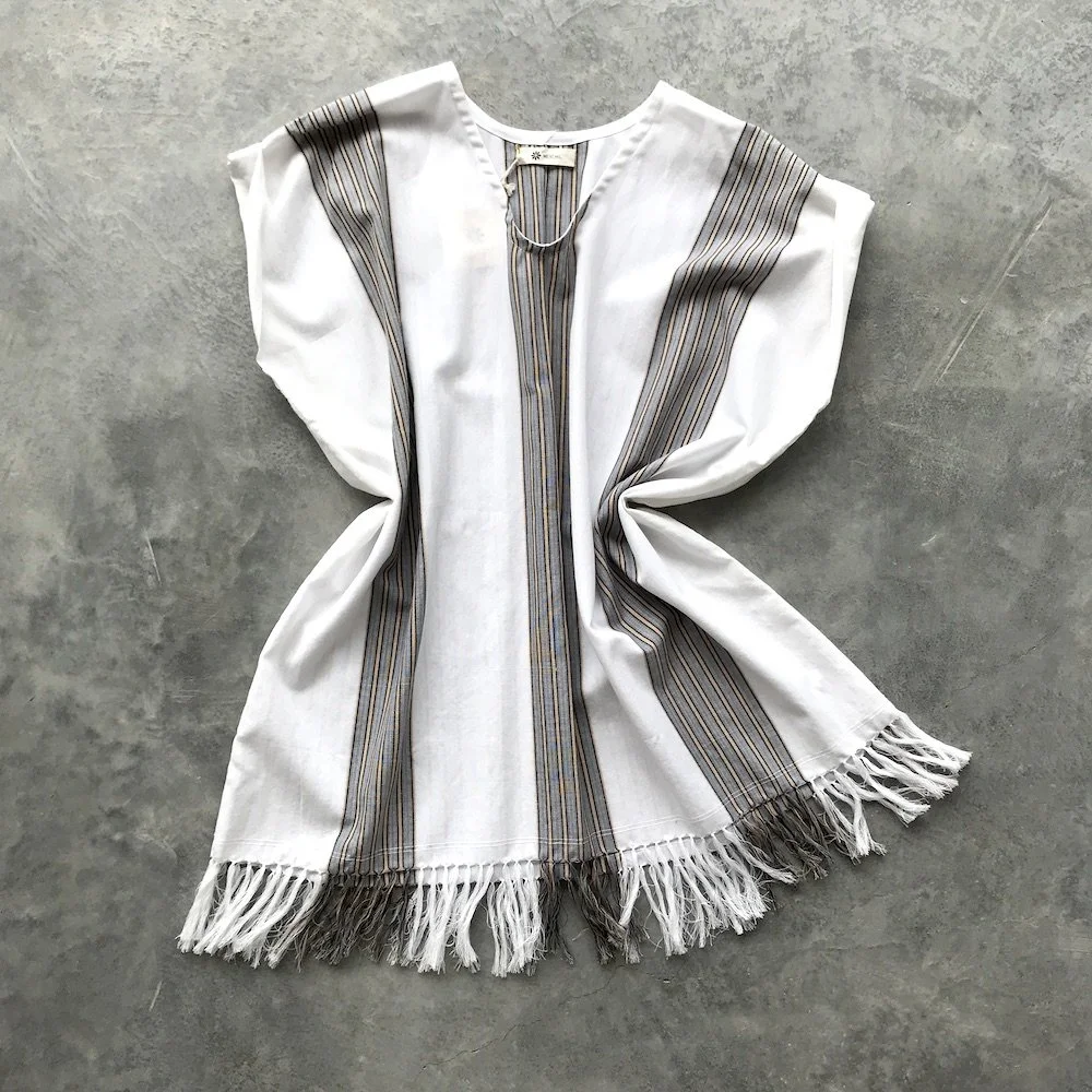 handwoven craft cotton embroidery macrame fringe rebozo shawl mexico mexican oaxaca chiapas toluca tenancingo estado de mexico highend highfashion moda textiles artisan artisanal natural dyes botanical dyes blue black plaid check blouse poncho top sh