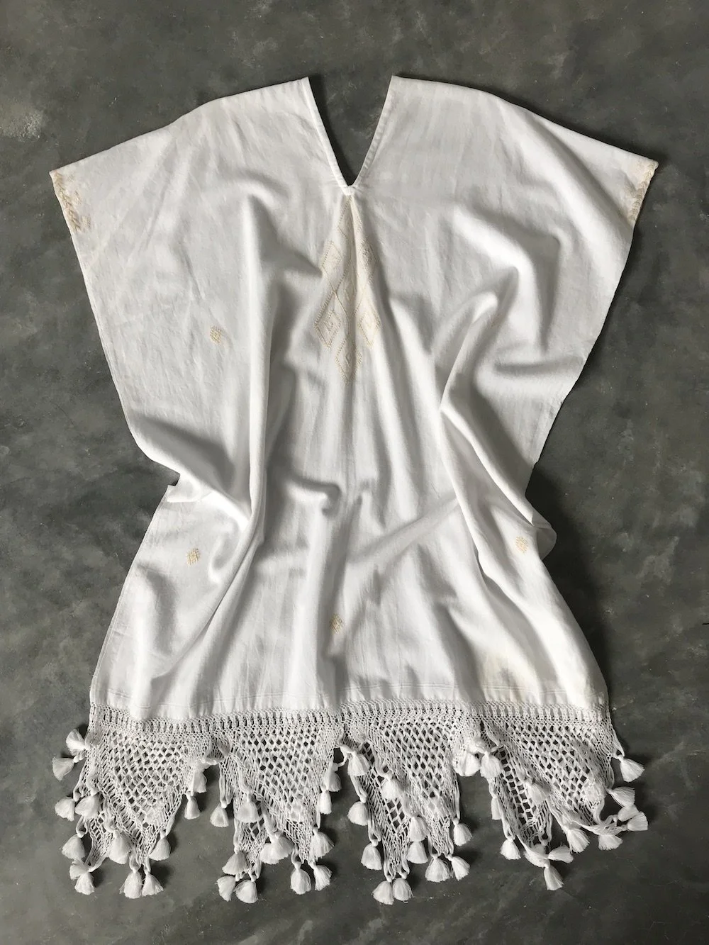 handwoven craft cotton embroidery macrame fringe rebozo shawl mexico mexican oaxaca chiapas toluca tenancingo estado de mexico highend highfashion moda textiles artisan artisanal natural dyes botanical dyes blue black plaid check blouse poncho top sh