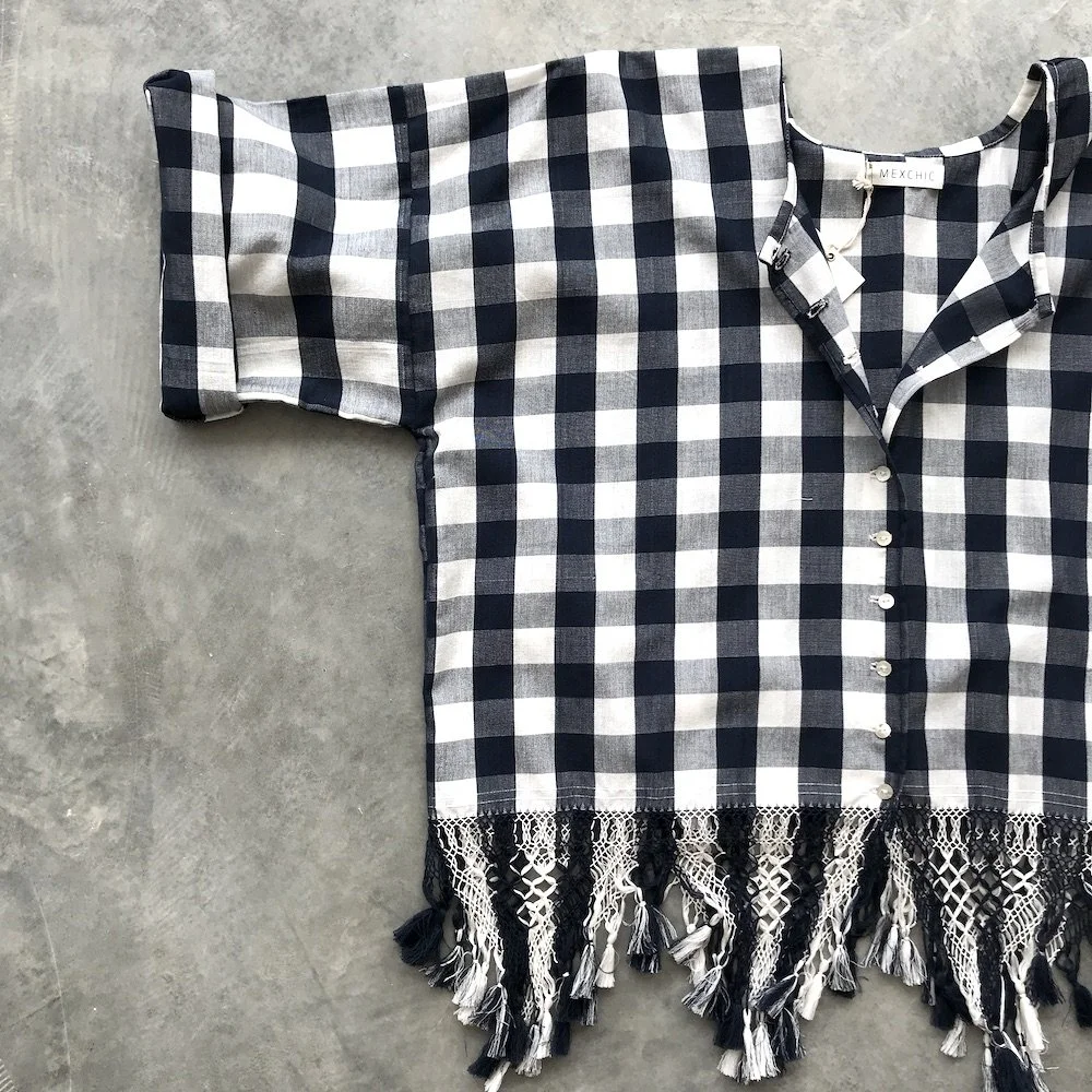 handwoven craft cotton embroidery macrame fringe rebozo shawl mexico mexican oaxaca chiapas toluca tenancingo estado de mexico highend highfashion moda textiles artisan artisanal natural dyes botanical dyes blue black plaid check blouse poncho top sh