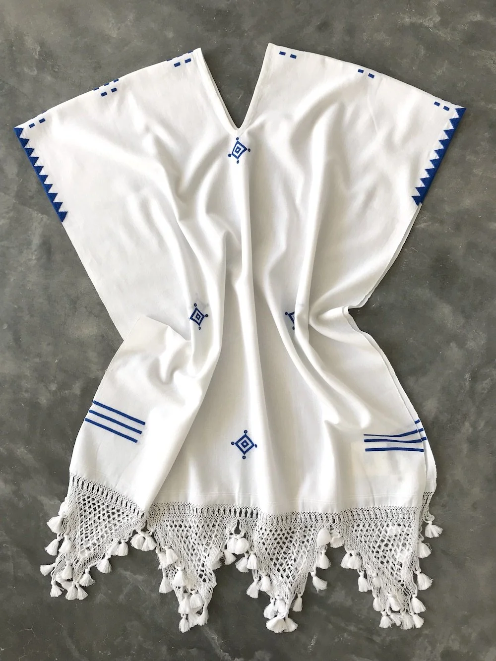 handwoven craft cotton embroidery macrame fringe rebozo shawl mexico mexican oaxaca chiapas toluca tenancingo estado de mexico highend highfashion moda textiles artisan artisanal natural dyes botanical dyes blue black plaid check blouse poncho top sh