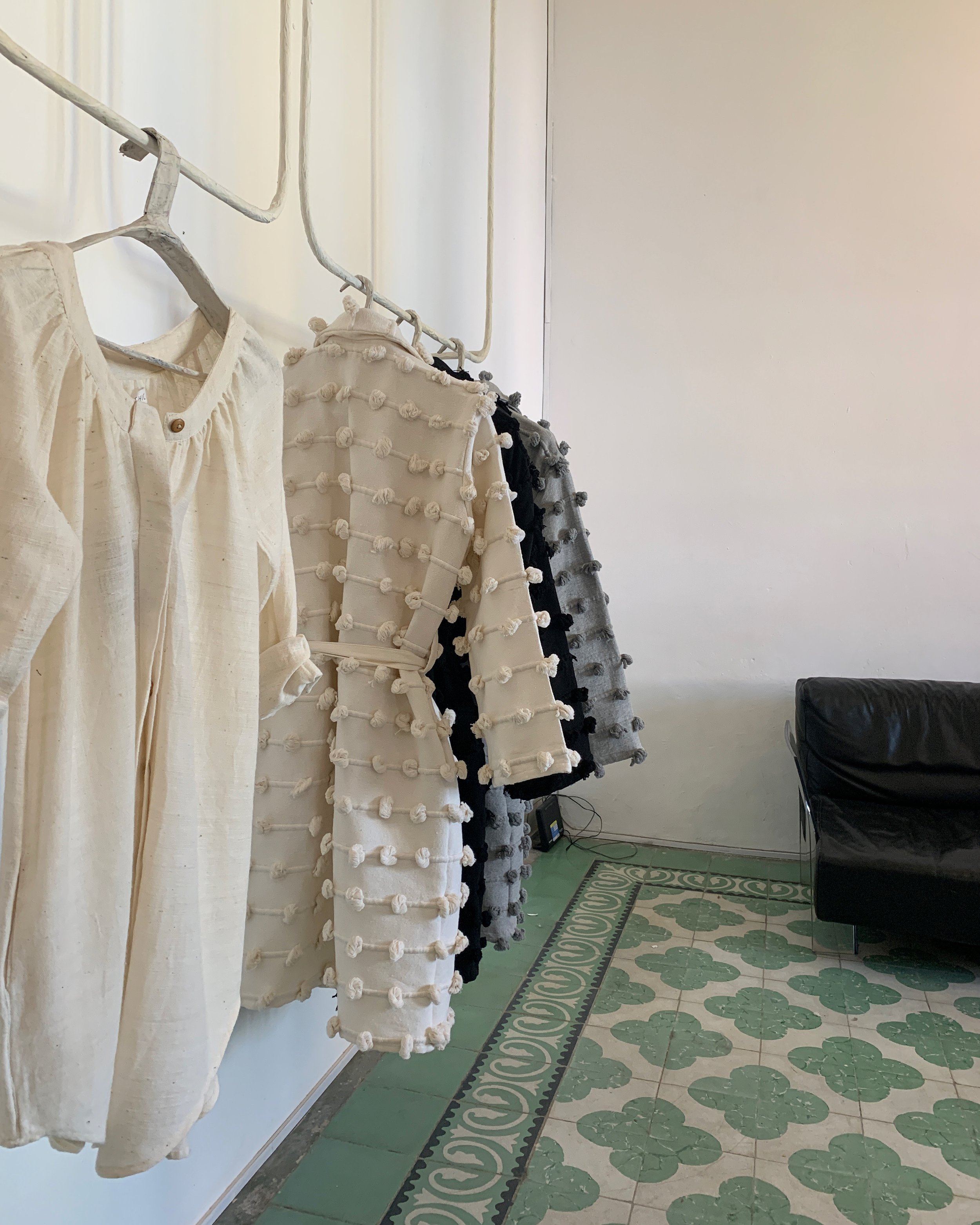 Mexchic shopping in Oaxaca, Mexico for clothing, textiles, home goods homewares, artisan made goods, boutique is a design shop hand woven natural ethically made sustainable regenerative cotton wool alpaca antique lace silk vintage natural dyes botani