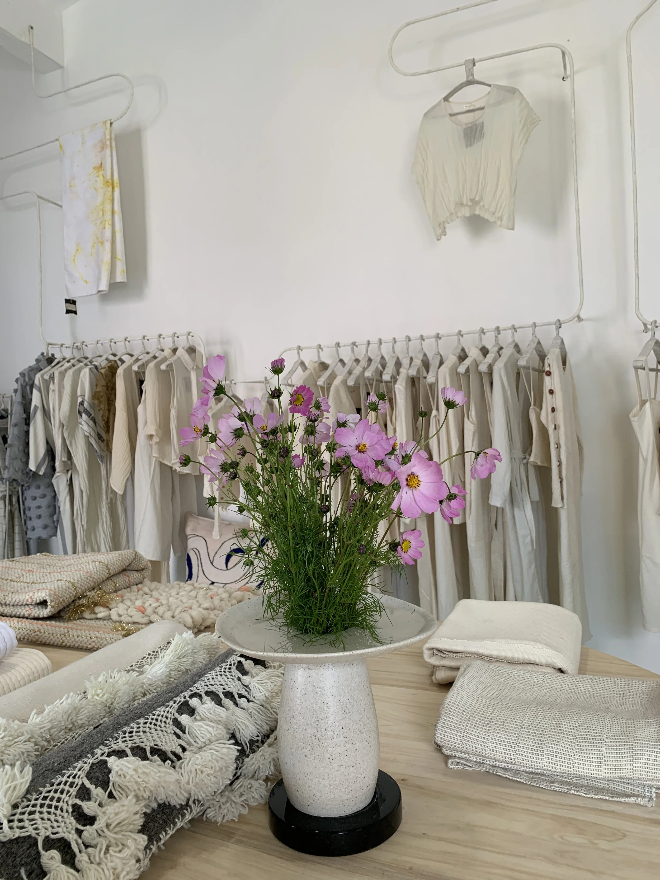 Mexchic shopping in Oaxaca, Mexico for clothing, textiles, home goods homewares, artisan made goods, boutique is a design shop hand woven natural ethically made sustainable regenerative cotton wool alpaca antique lace silk vintage natural dyes botani