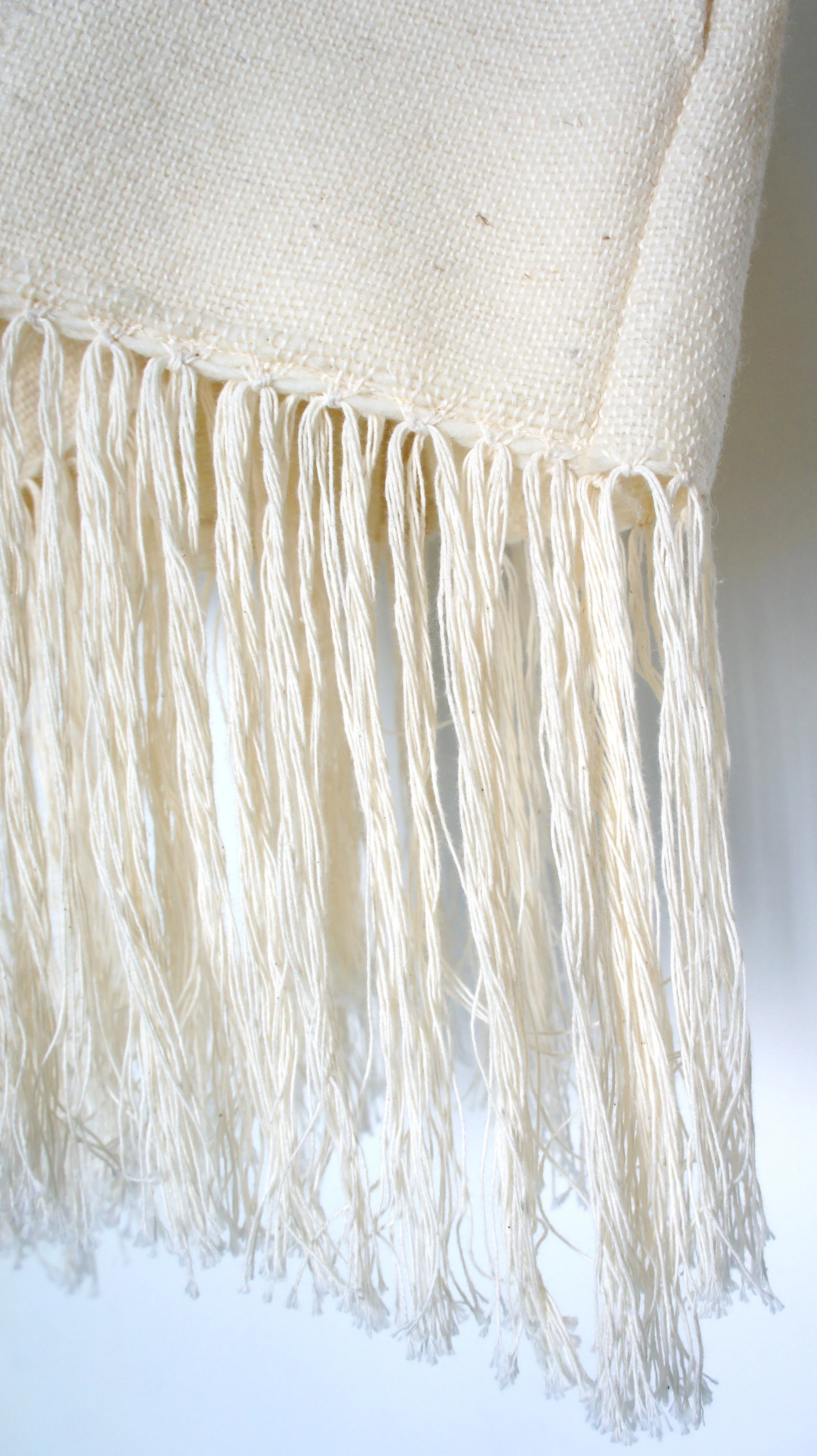 Mexchic Lightweight jacket with fringe, created in collaboration with Mexican textile artist / weaver Jimena Rangel. Handwoven on a Saori loom, in her studio located in Central Mexico, with a lovely soft and plush rustic wool procured from local shee