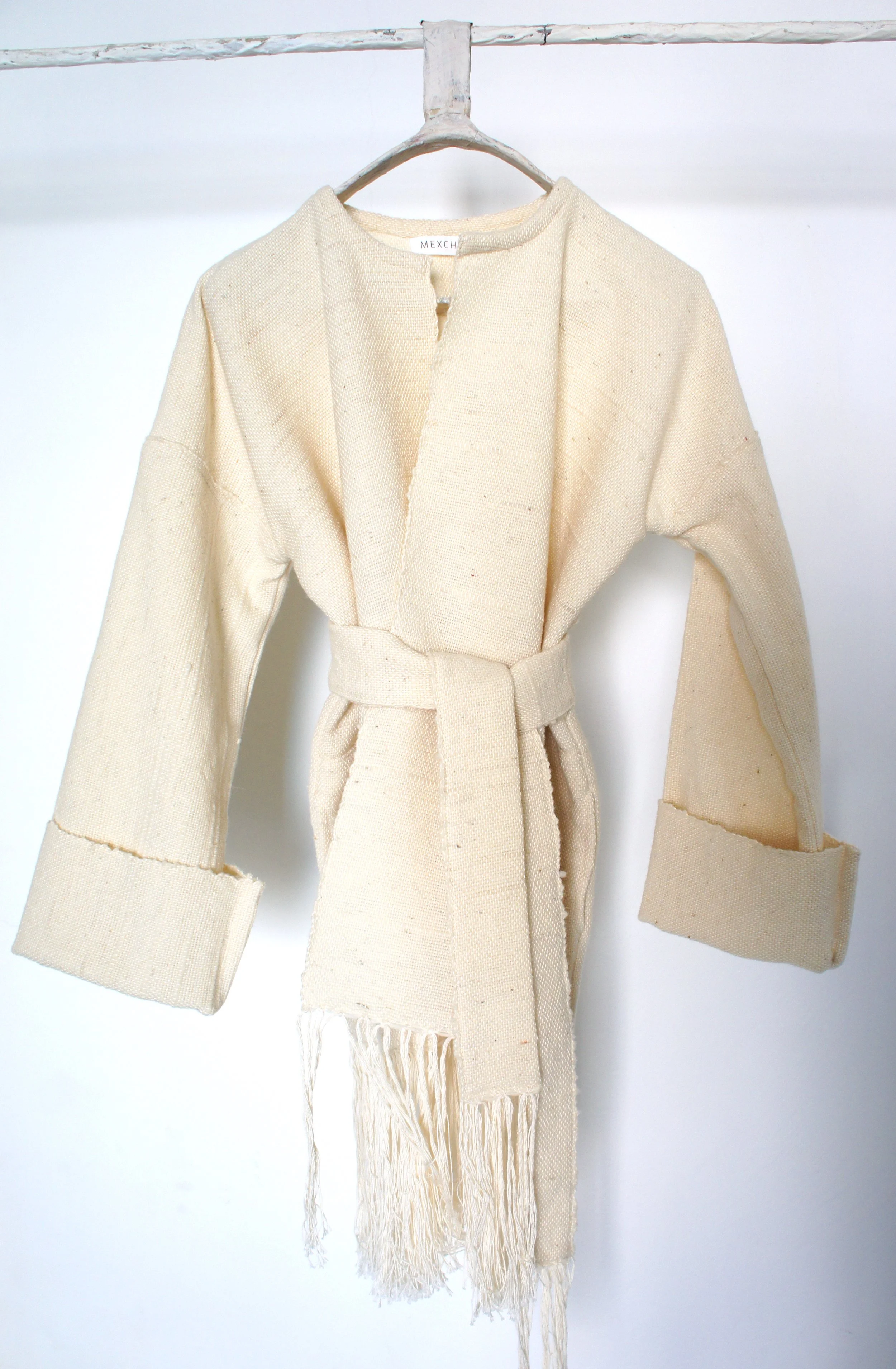 Mexchic Lightweight jacket with fringe, created in collaboration with Mexican textile artist / weaver Jimena Rangel. Handwoven on a Saori loom, in her studio located in Central Mexico, with a lovely soft and plush rustic wool procured from local shee
