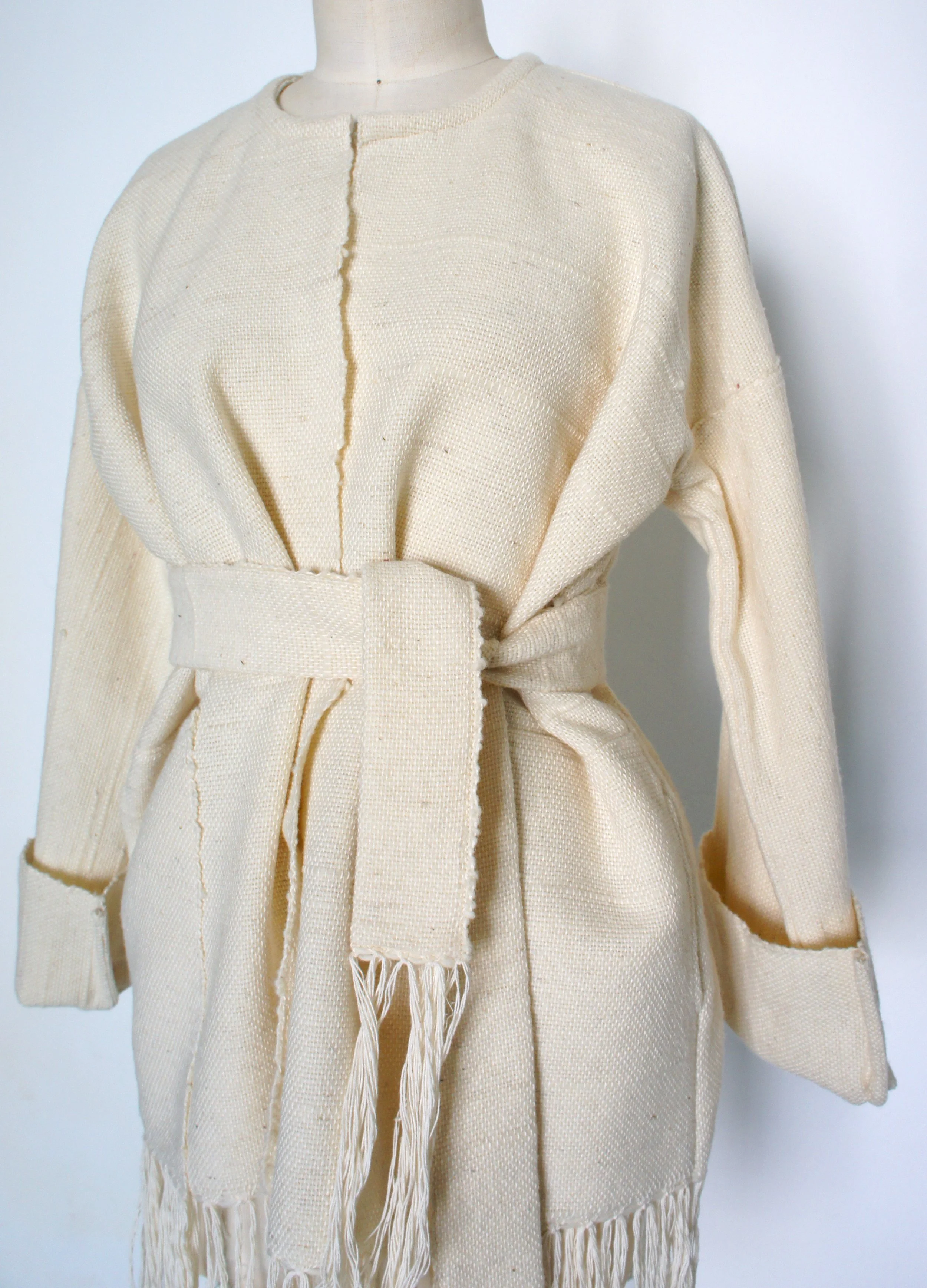 Mexchic Lightweight jacket with fringe, created in collaboration with Mexican textile artist / weaver Jimena Rangel. Handwoven on a Saori loom, in her studio located in Central Mexico, with a lovely soft and plush rustic wool procured from local shee