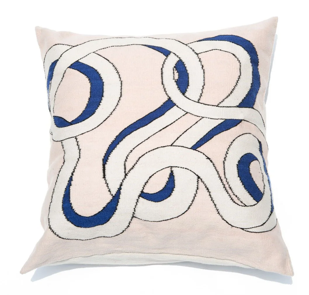 Mexchic handwoven floor pillow curvy loops pink blue cream contemporary craft Quetzalcoatl plumed serpent Oaxaca teotitlan del valle Mexican design
