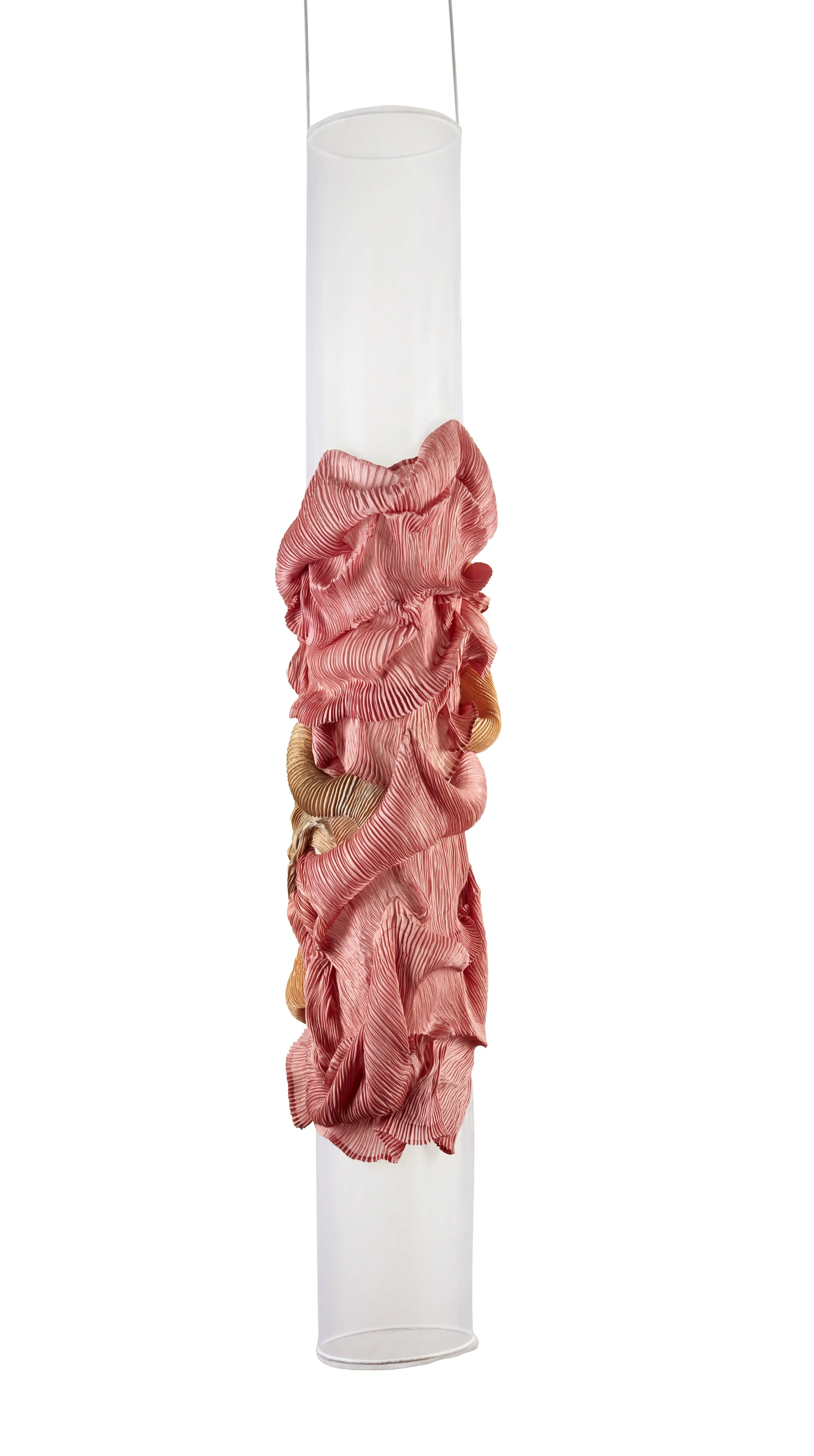 Decorative art installation consisting of a tall white cylindrical tube with colorful ruffled fabric strips attached vertically around the lower half.