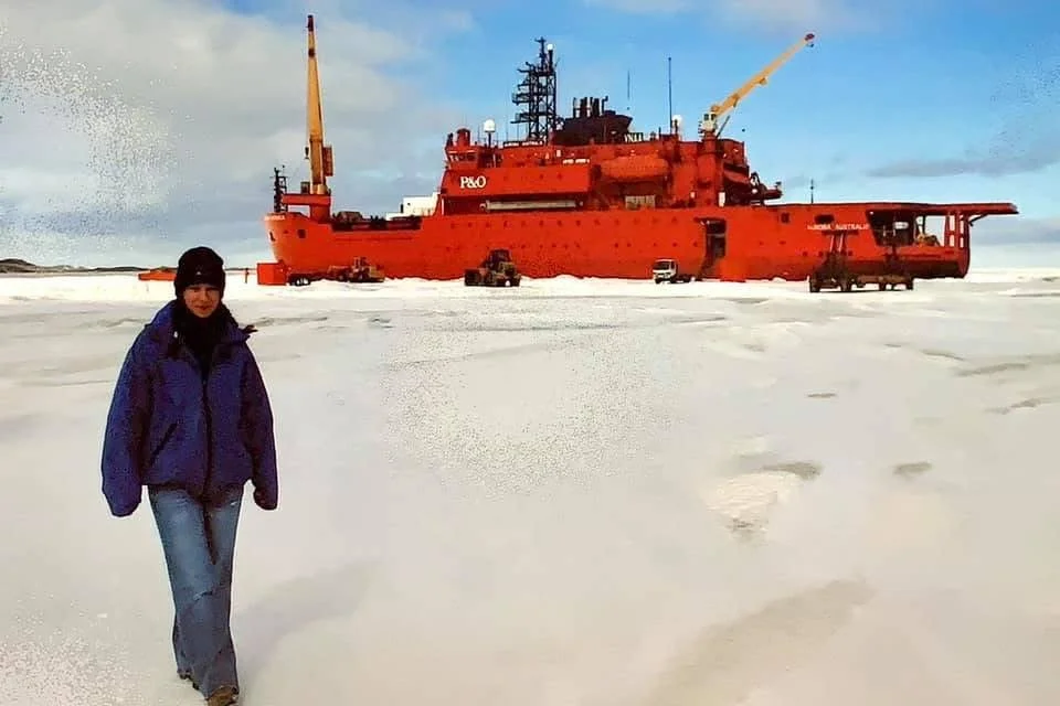 Kate Meyer - Davis Research Station, Antarctica with Aurora Australis in the background - 2006