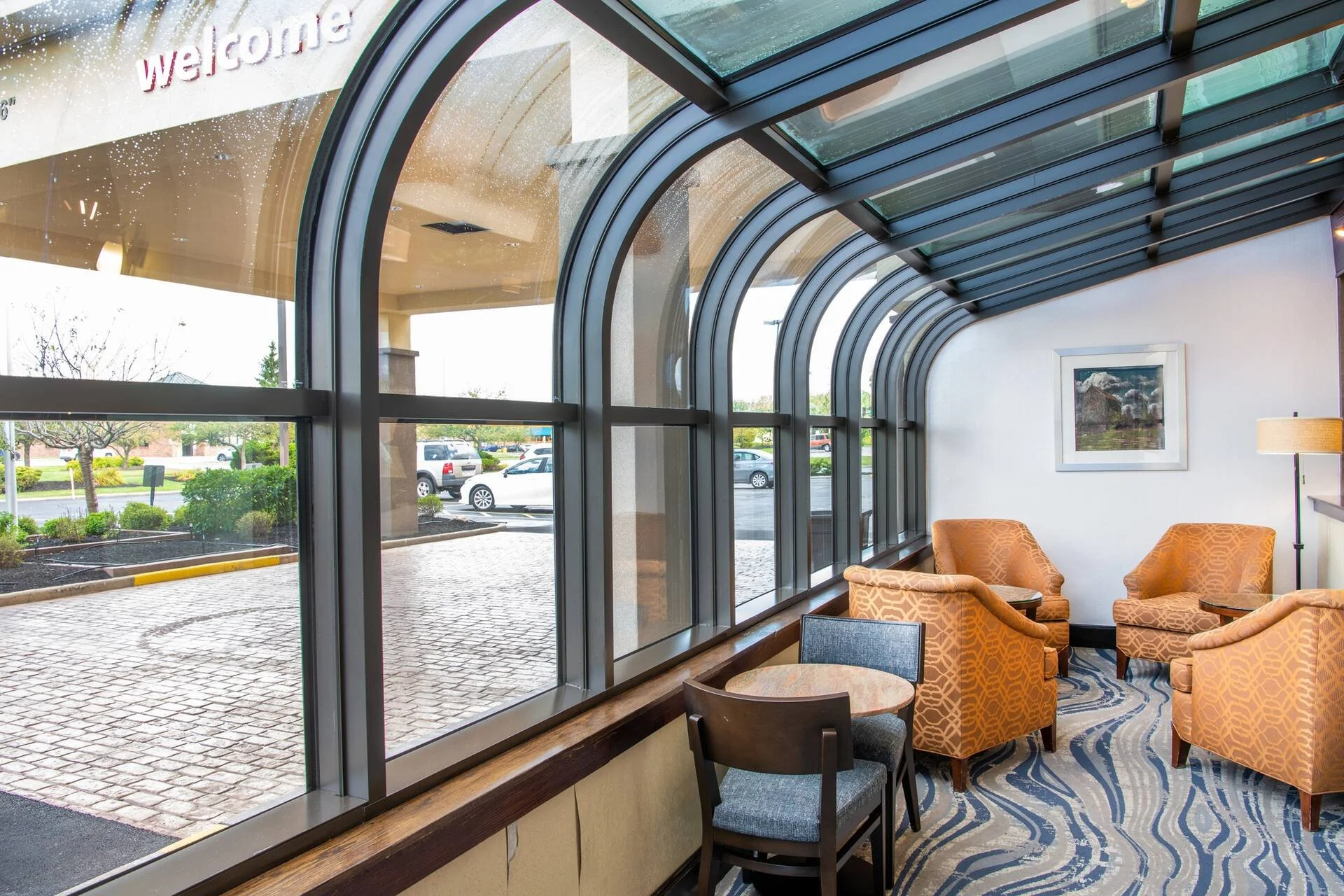 Sunlit lobby seating at Hampton Inn Cleveland/Solon, Ohio