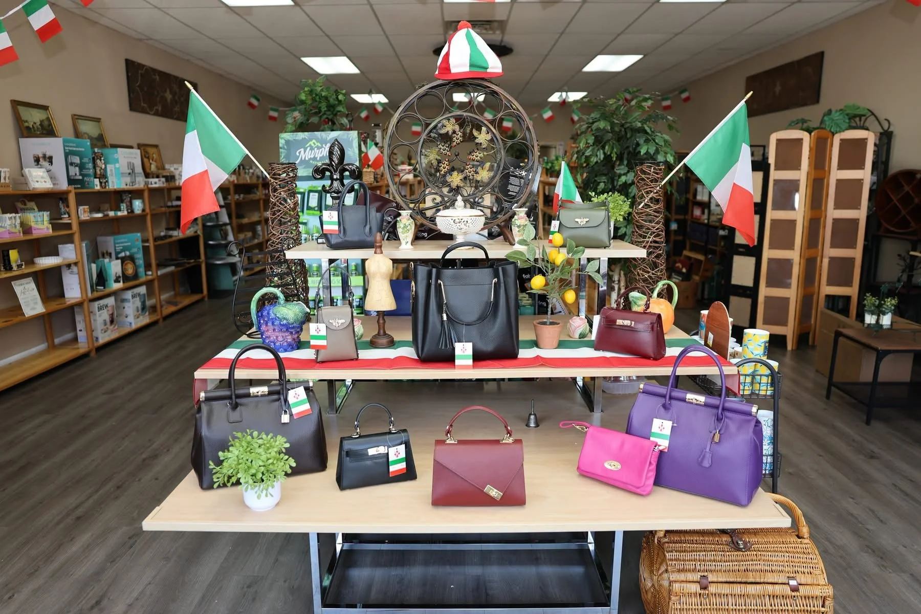 Inside Casa Di Spirito in Collinsville, Illinois, with handbags, Italian flags, gifts, and home décor on display.