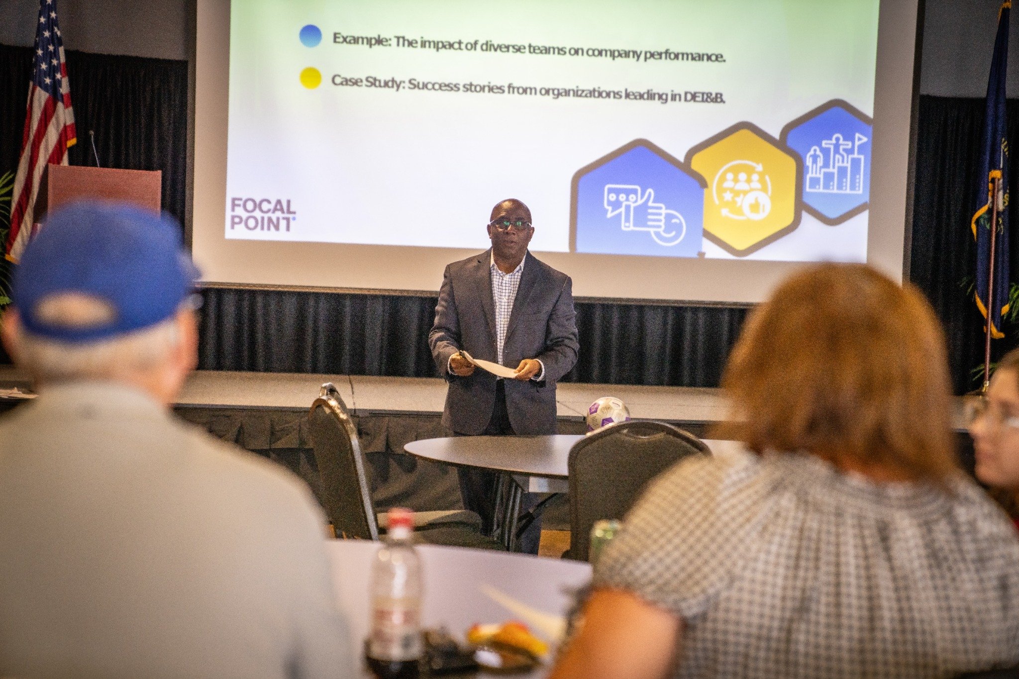 Dr. Terry Daniels delivering a leadership keynote to an audience