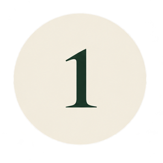 Close-up of a circular button with the number one printed on it.