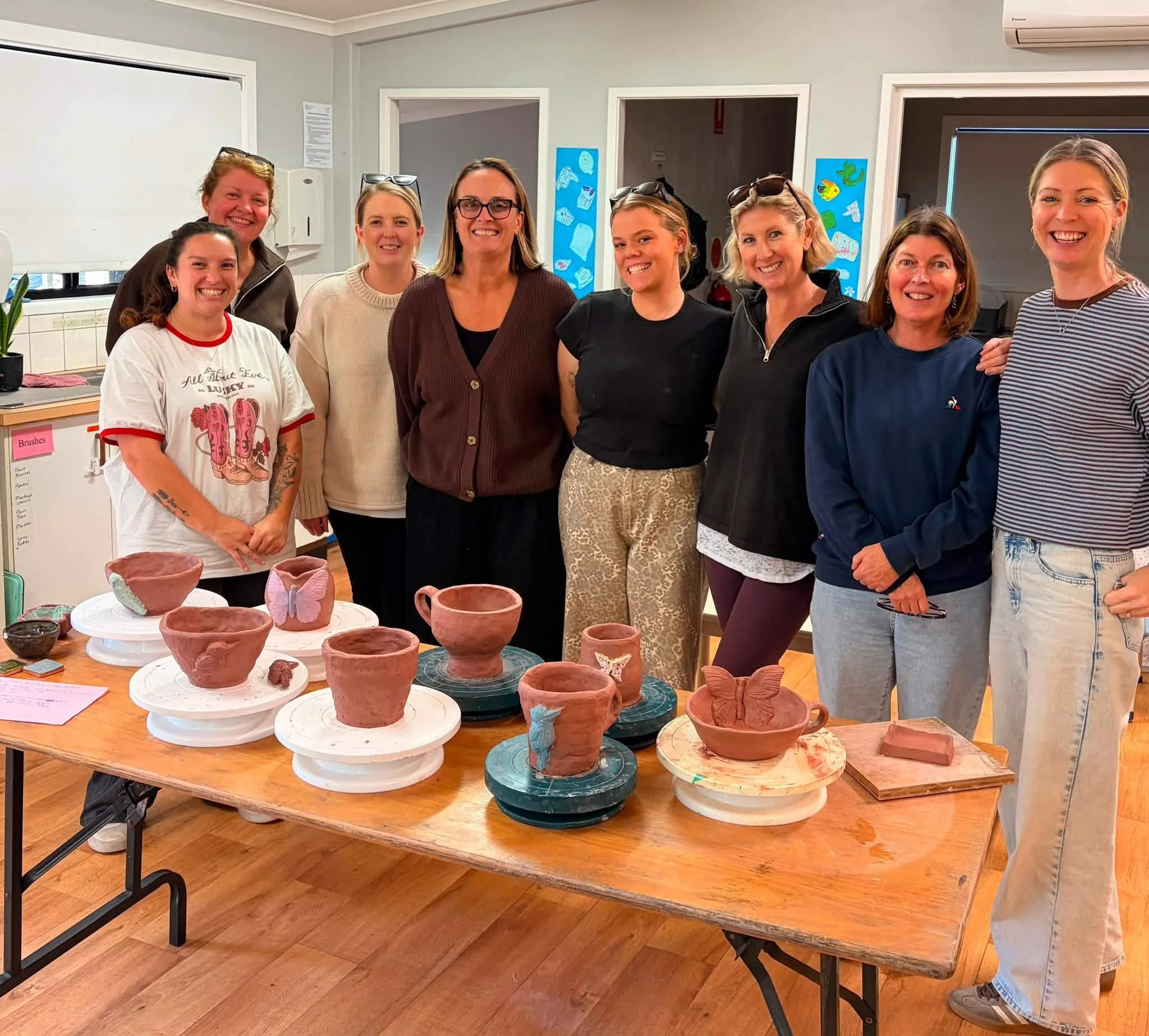 The Staff from Bundeena Preschool with their team building day workshop pots from one of Casey Anne St Johns private workshops