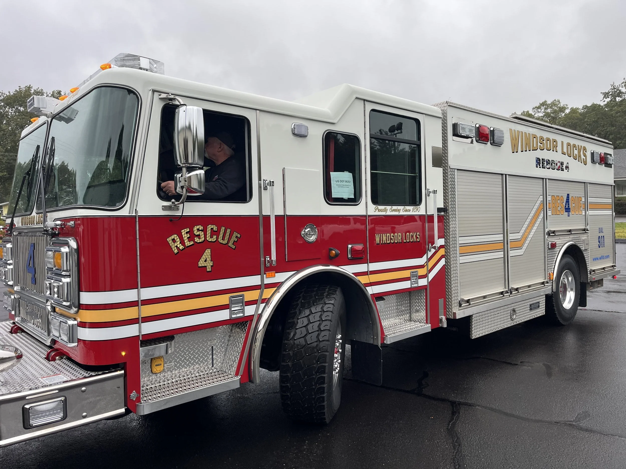 Reflective striping pattern, engine turn gold leaf lettering for Windsor Locks, CT