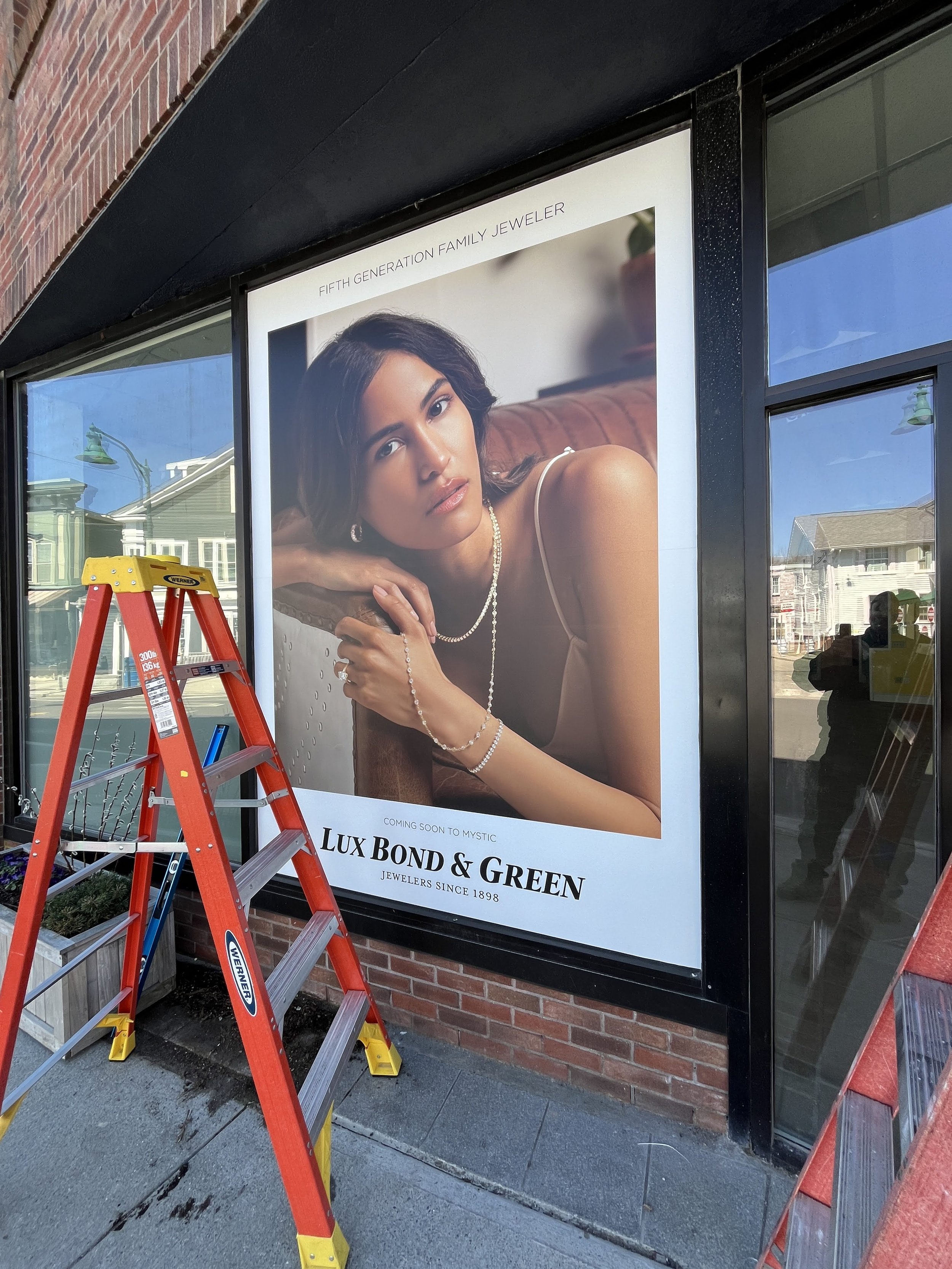 large window graphic printed for Lux Bond & Green's new location - Mystic, CT