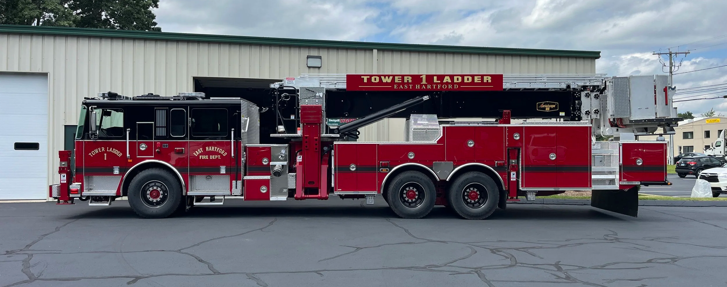 Complete reflective striping and gold leaf lettering for a brand new East Hartford, CT FD ladder truck