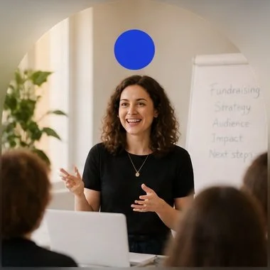 A woman is giving a workshop to a group of people