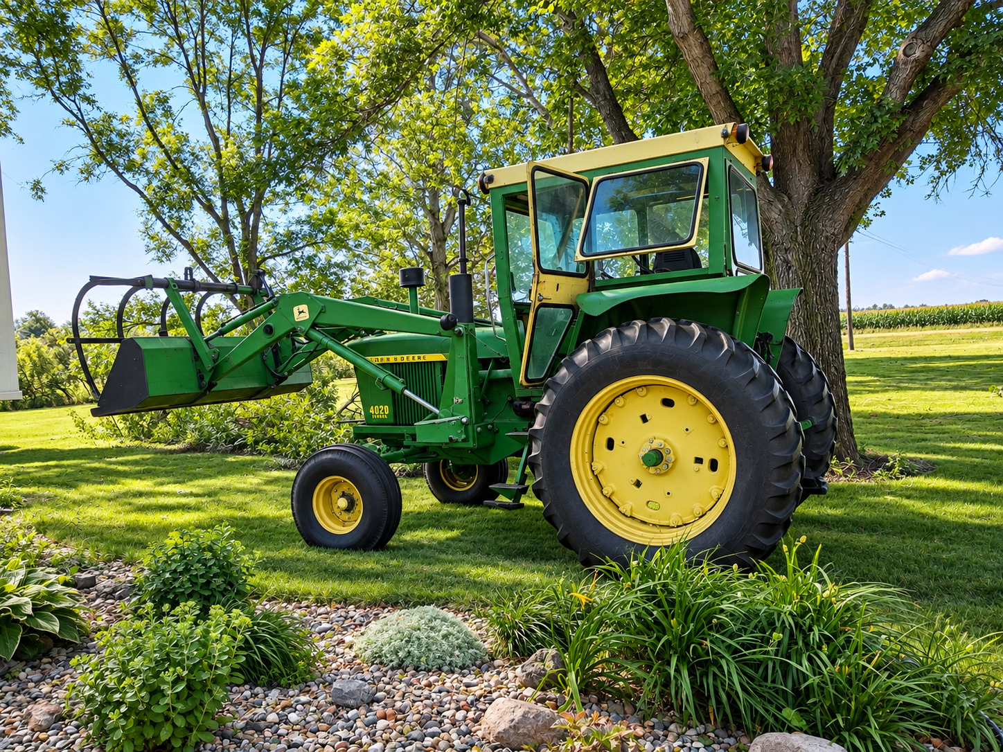 Green and yellow John Deere tractor parked on a grass lawn near trees and plants in a rural setting on a sunny day.