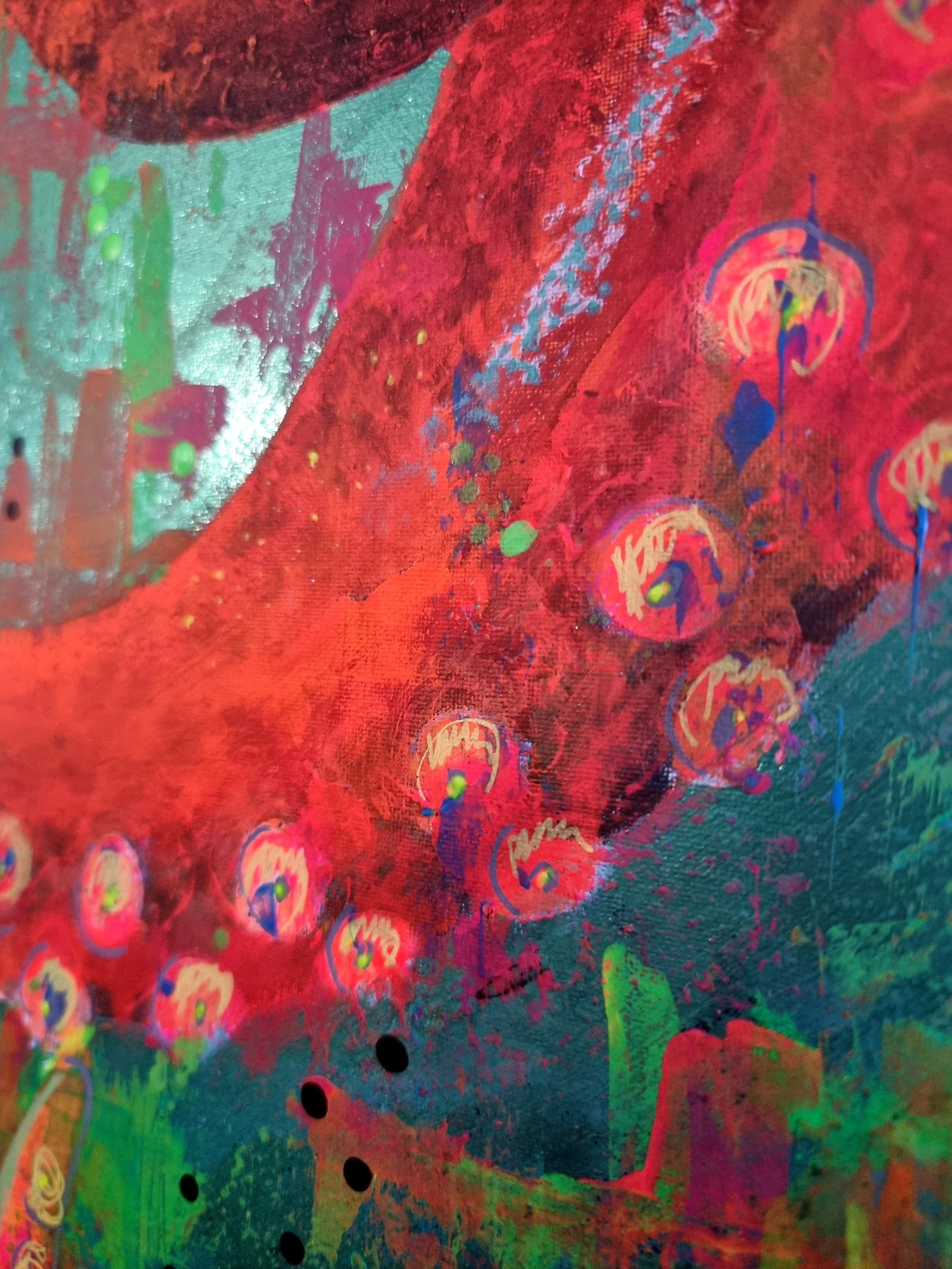 Close-up of a colorful, abstract painted surface with red, green, pink, blue, purple, yellow, black, and orange splashes and patterns, including circular designs and fluorescence effects.
