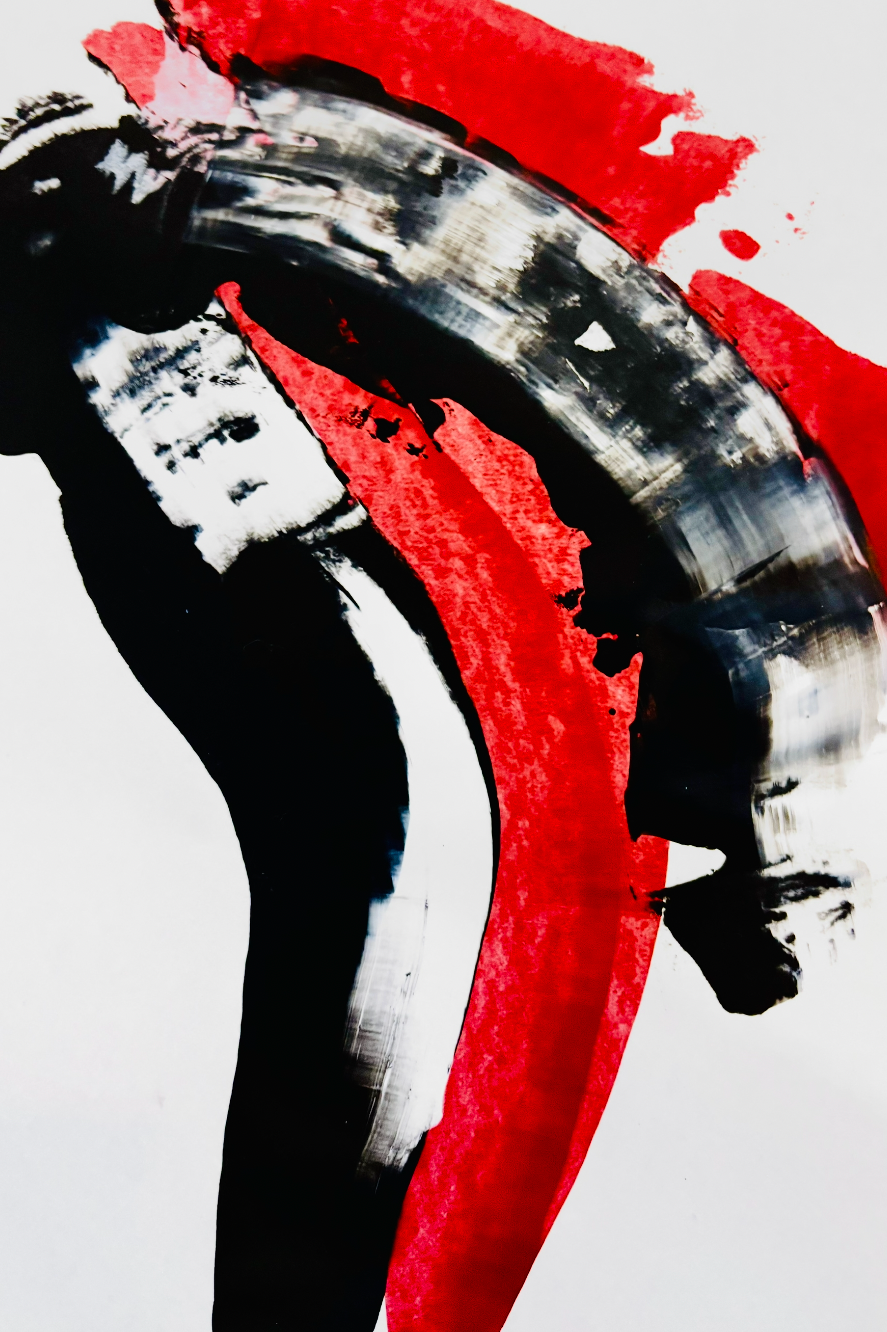 Abstract black, white, and red brushstroke painting on white background.