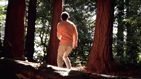 Man dancing in forest