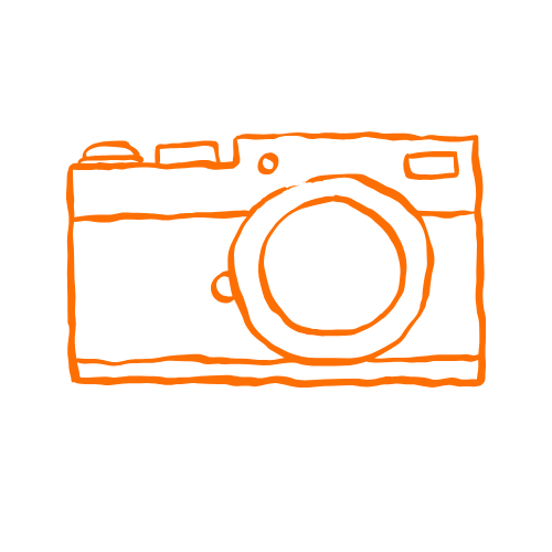 Orange outline drawing of a camera.