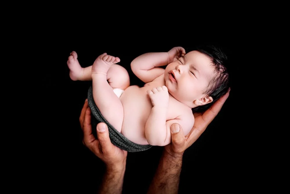 Newborn photography in Austin, Texas by Breeanna Rose Photography. Newborn portrait.