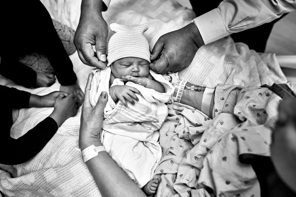 Birth photography in Austin, Texas by Breeanna Rose Photography. Birth story photograph, black and white.