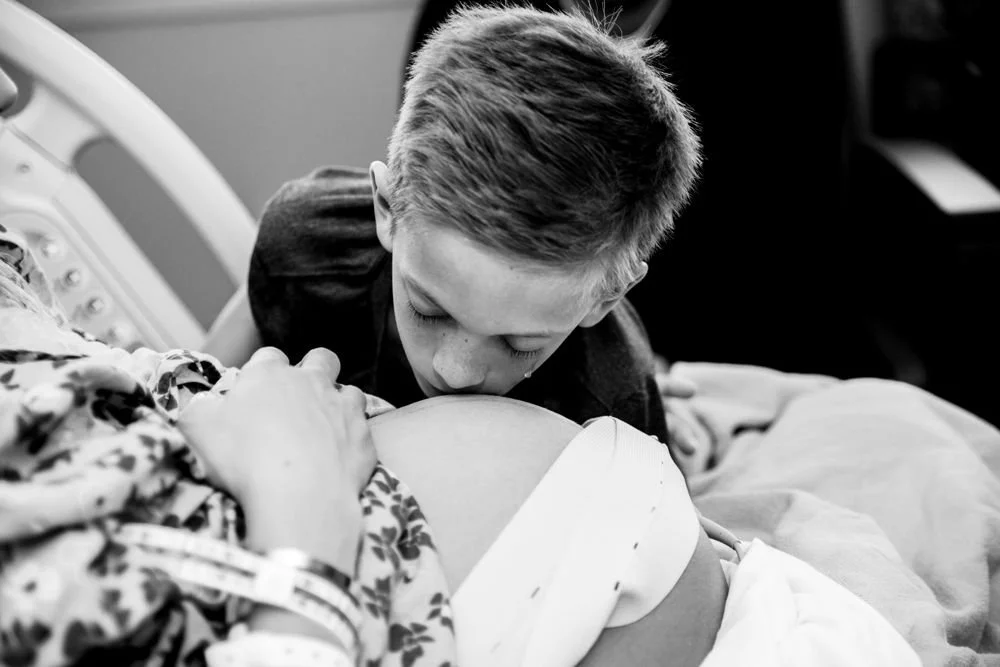 Birth photography in Austin, Texas by Breeanna Rose Photography. Birth story photograph, black and white.