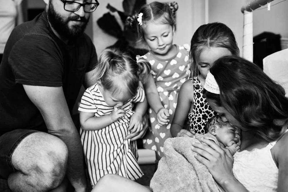 Birth photography in Austin, Texas by Breeanna Rose Photography. Birth story photograph, black and white.
