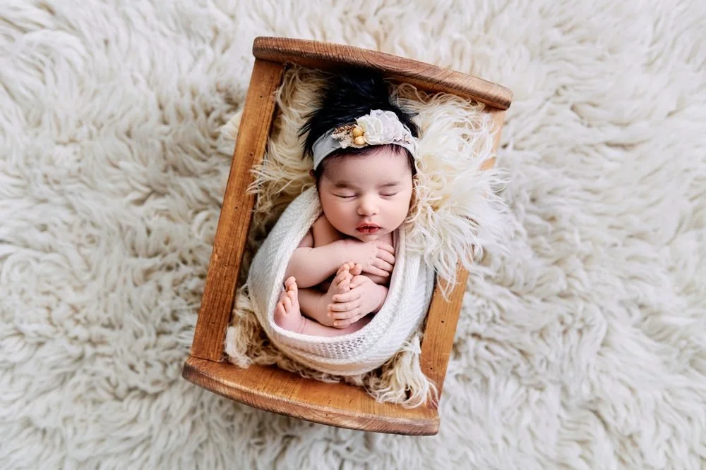Newborn photography in Austin, Texas by Breeanna Rose Photography. Newborn portrait.