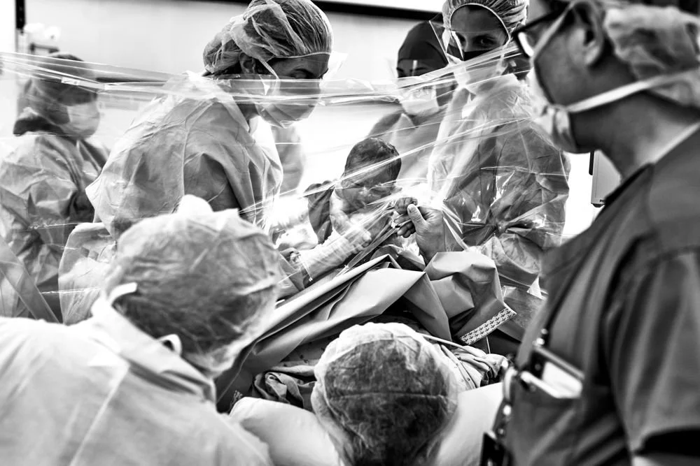 Birth photography in Austin, Texas by Breeanna Rose Photography. Birth story photograph, black and white.