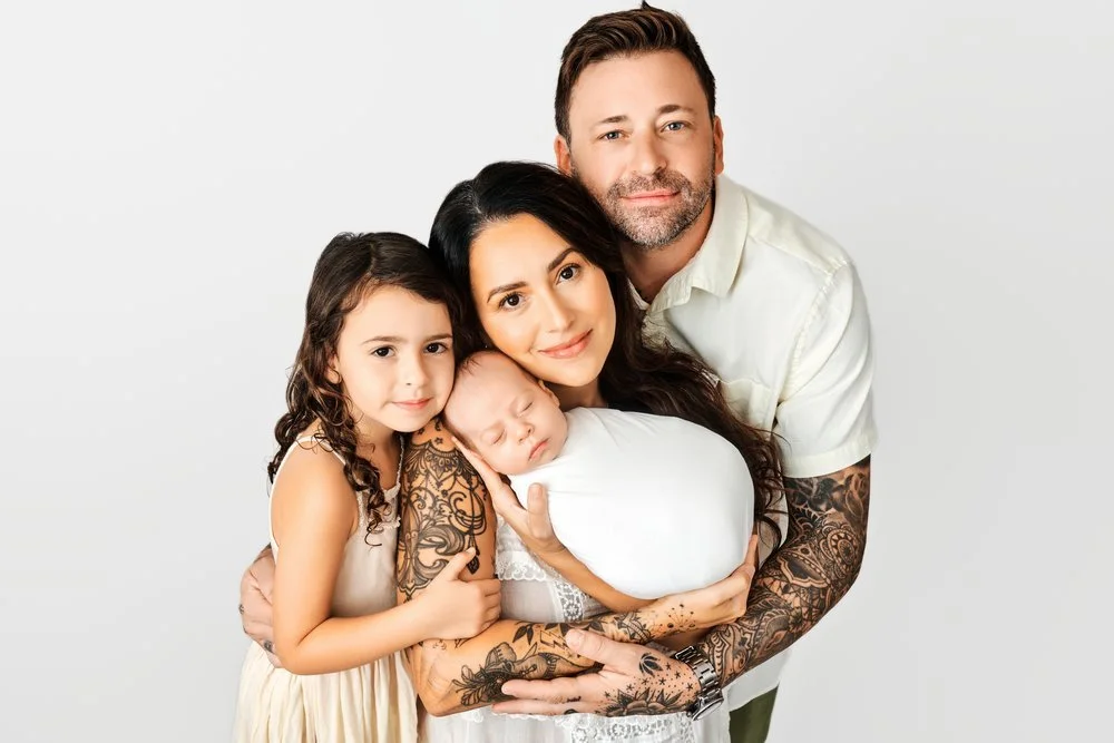 Newborn photography in Austin, Texas by Breeanna Rose Photography. Full family portrait.