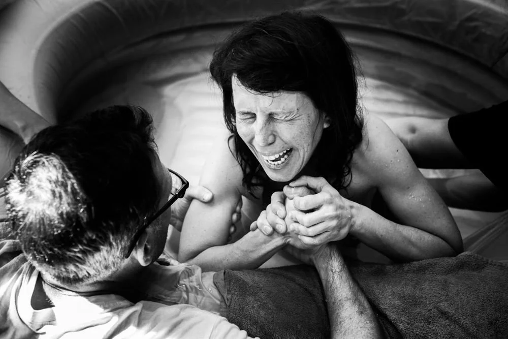 Birth photography in Austin, Texas by Breeanna Rose Photography. Birth story photograph, black and white.