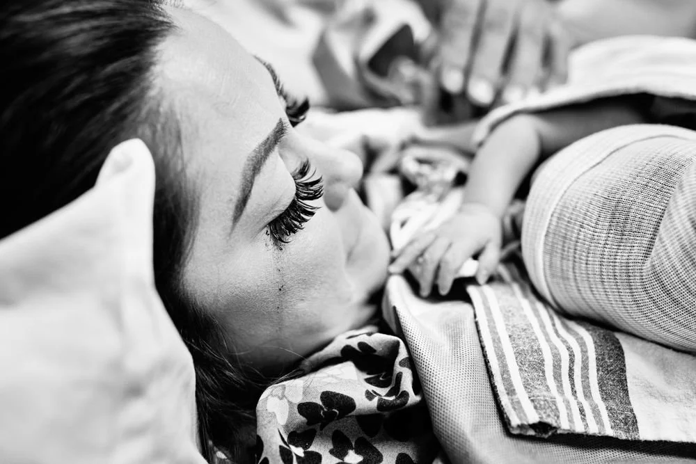 Birth photography in Austin, Texas by Breeanna Rose Photography. Birth story photograph, black and white.
