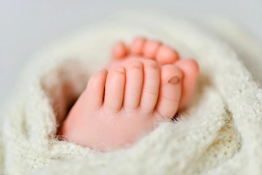 Newborn photography in Austin, Texas by Breeanna Rose Photography. Macro feet.