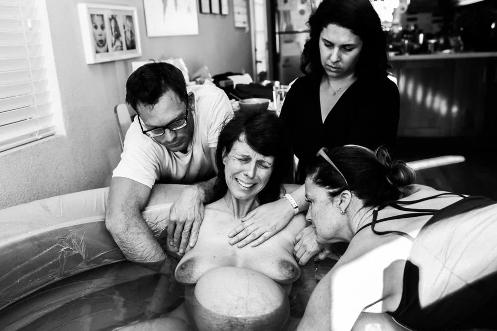 Birth photography in Austin, Texas by Breeanna Rose Photography. Birth story photograph, black and white.