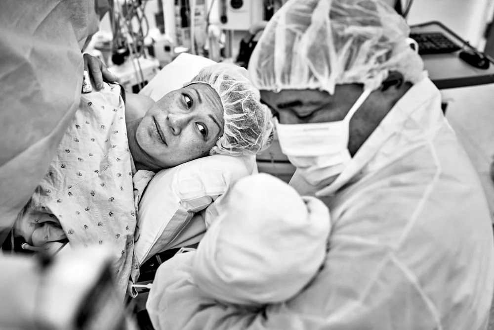 Birth photography in Austin, Texas by Breeanna Rose Photography. Birth story photograph, black and white.